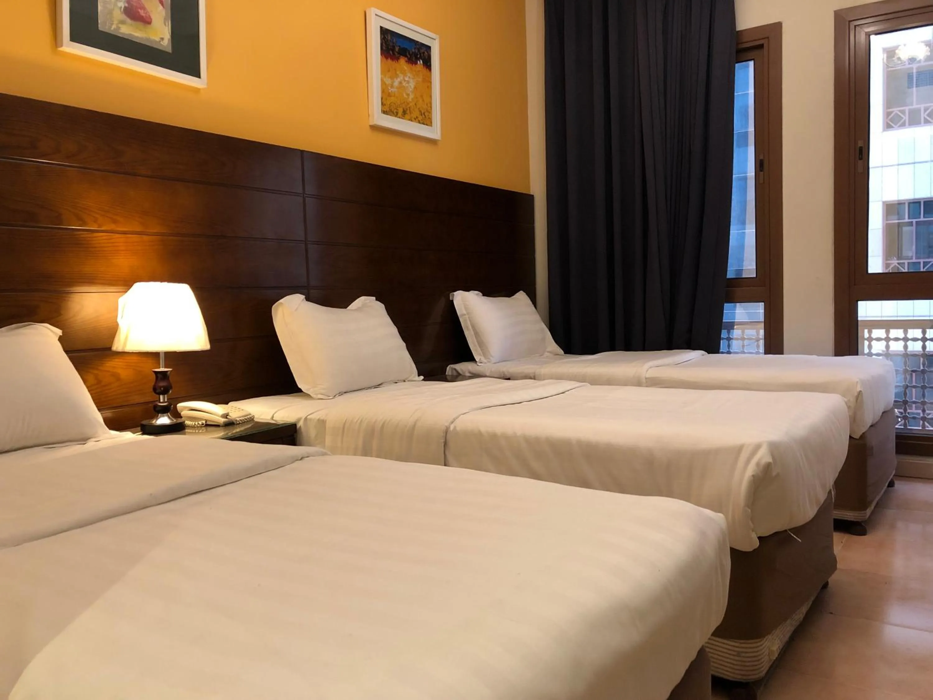 Bed in Manazel Alaswaf Hotel