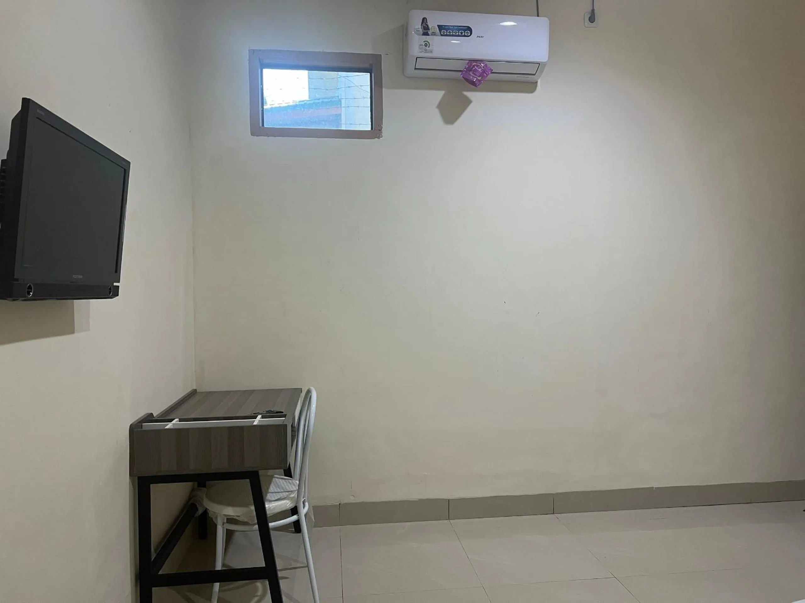 Bedroom in Hotel O Wisma Aliyah Near Sidrap