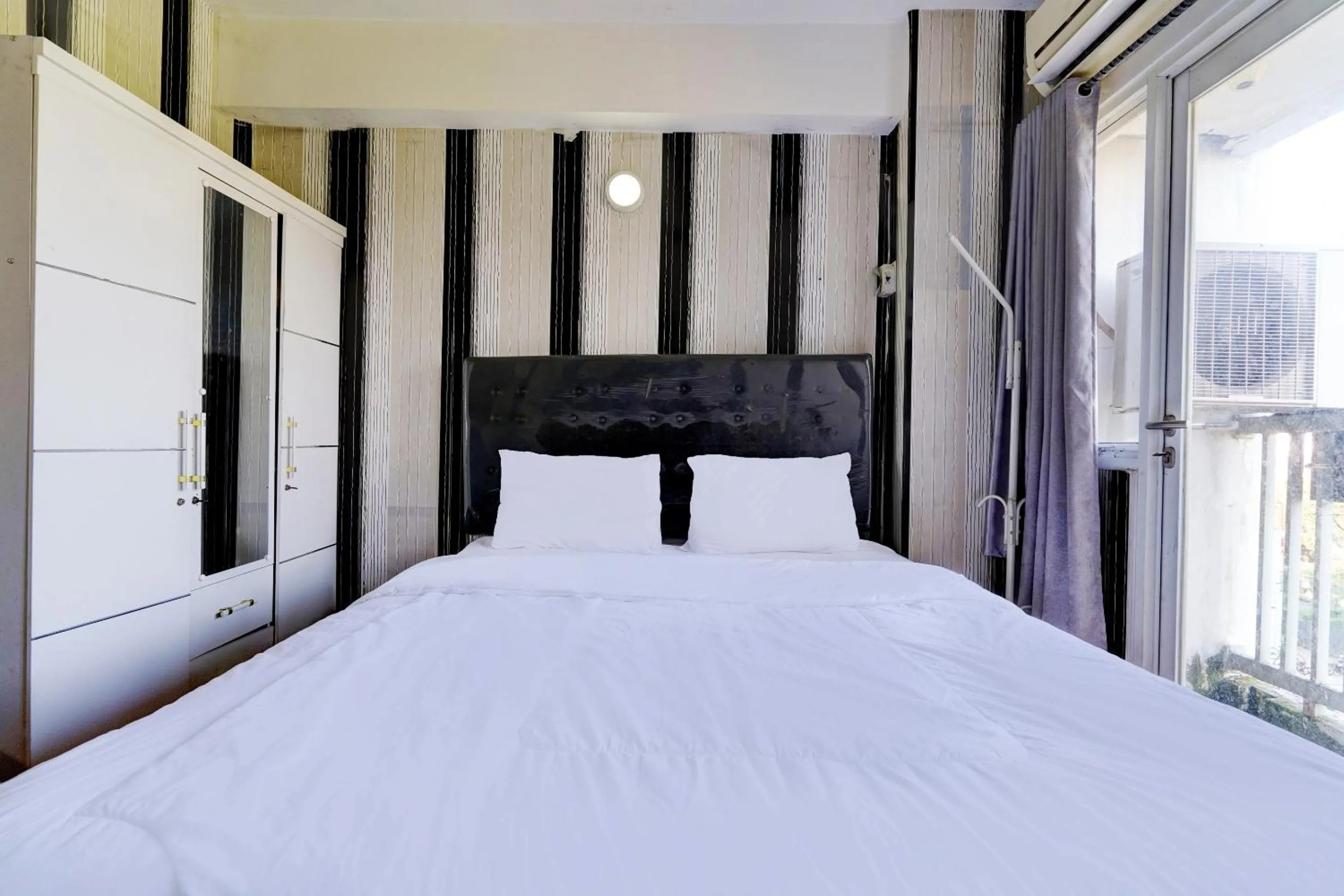 Bedroom, Bed in OYO Life 92874 Apartement Grand Sentraland Karawang By Red Dragon