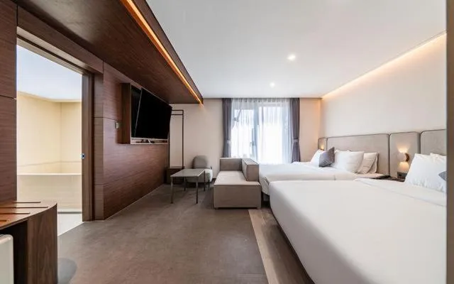 Photo of the whole room, Bed in Hound Hotel Gijang Osiria