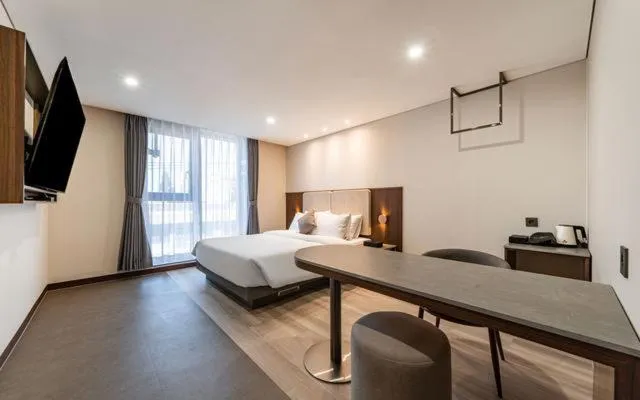 Photo of the whole room, Bed in Hound Hotel Gijang Osiria