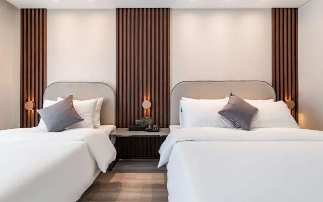 Photo of the whole room, Bed in Hound Hotel Gijang Osiria