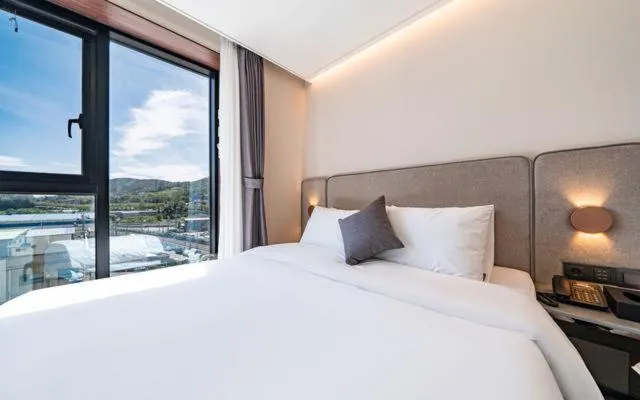 Photo of the whole room, Bed in Hound Hotel Gijang Osiria