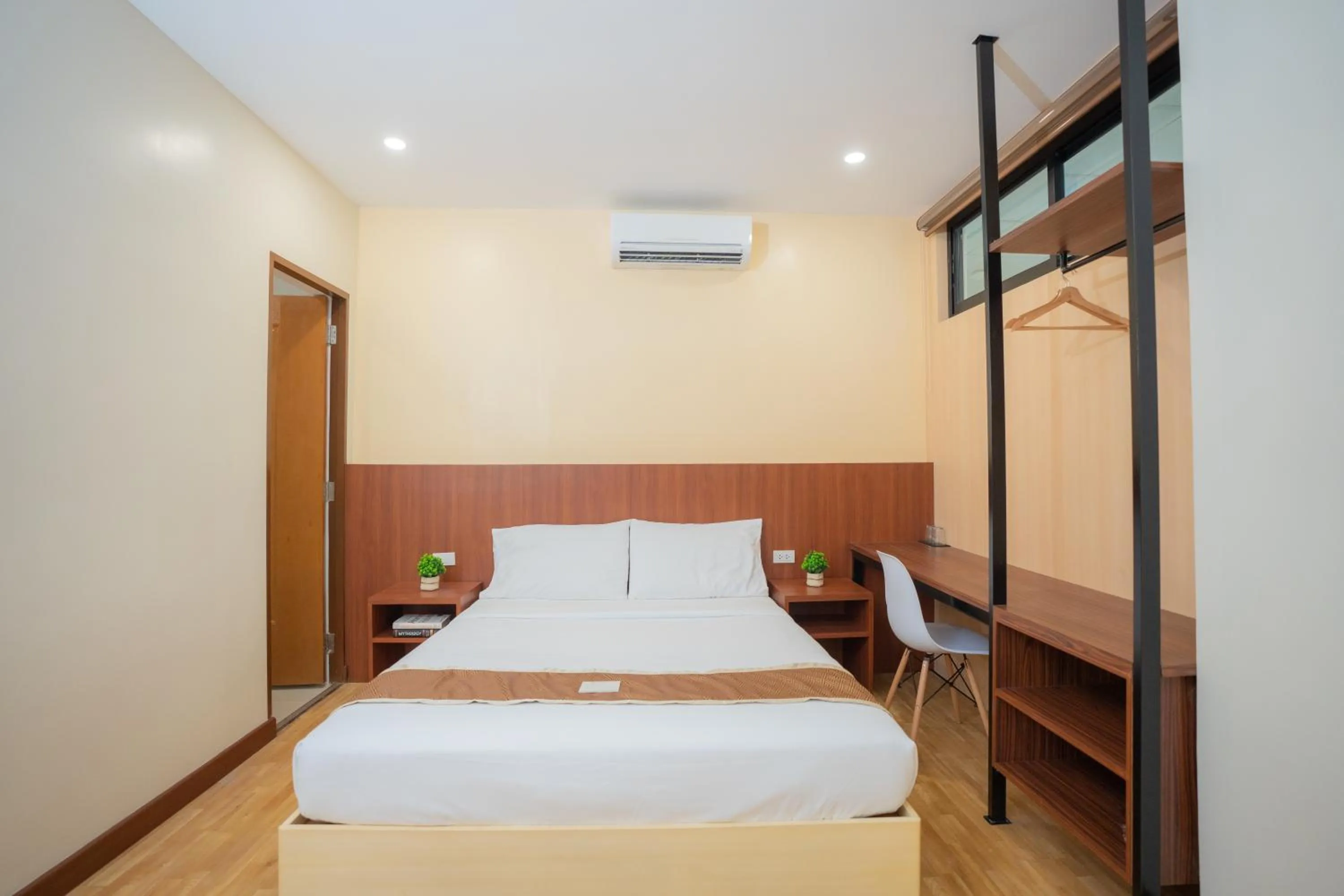 Bed in Sundaze Hotel