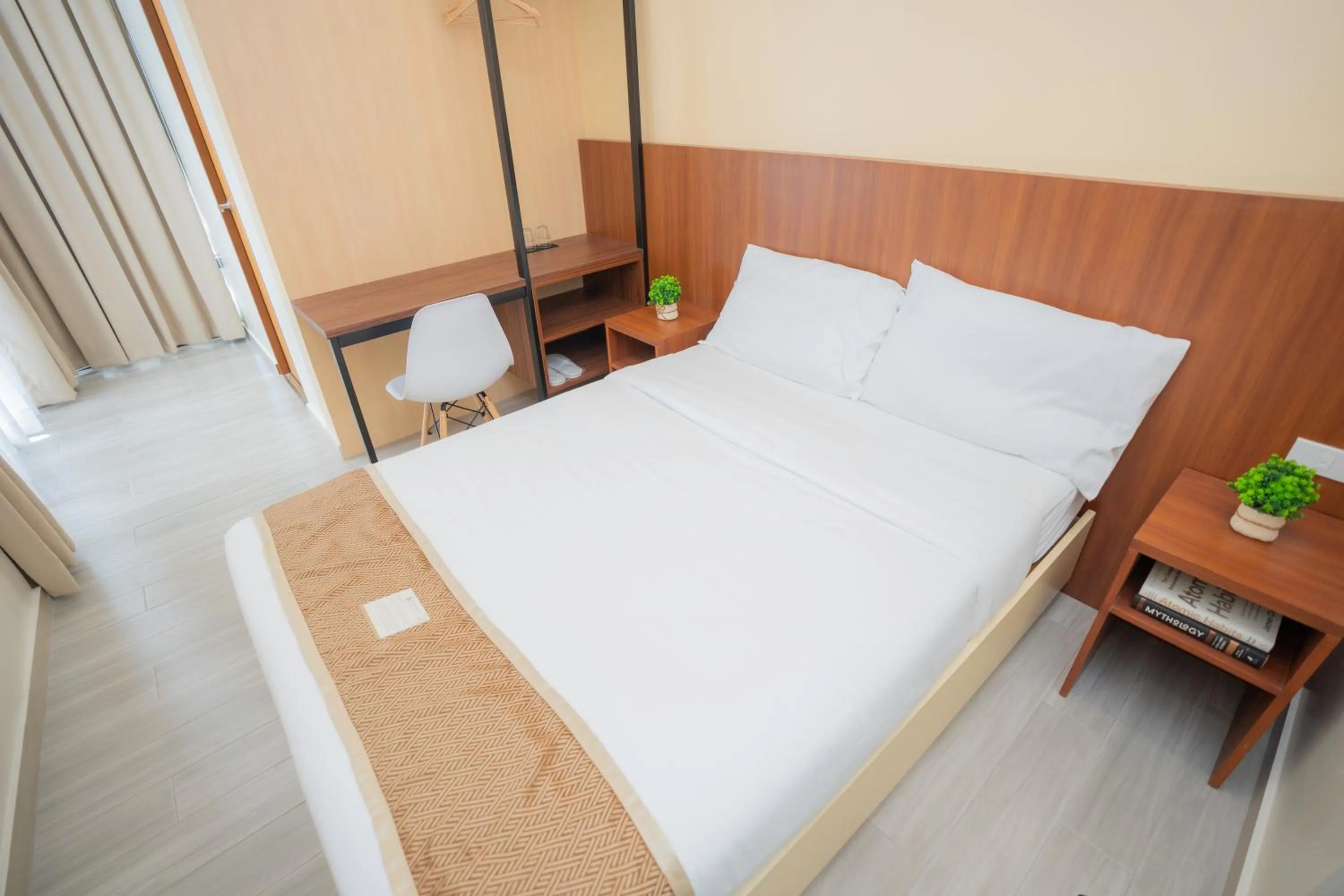 Bed in Sundaze Hotel