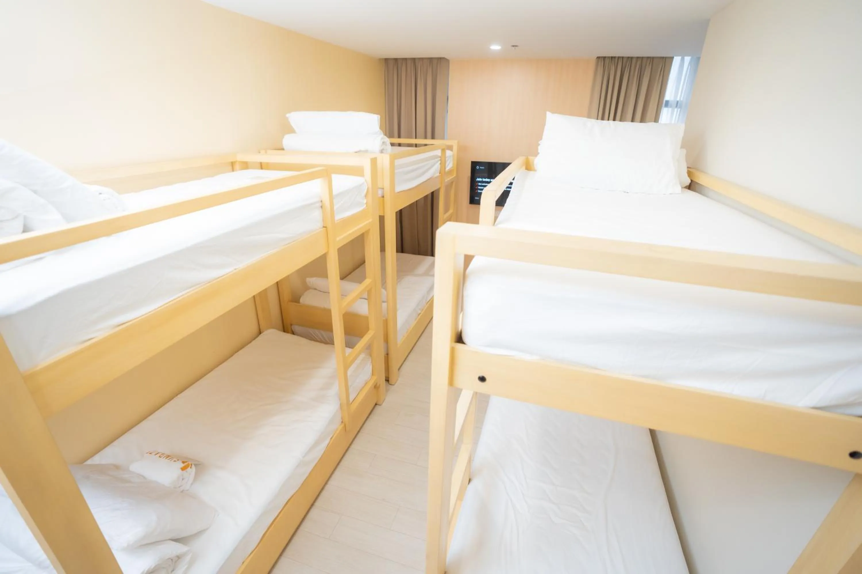 Bed in Sundaze Hotel