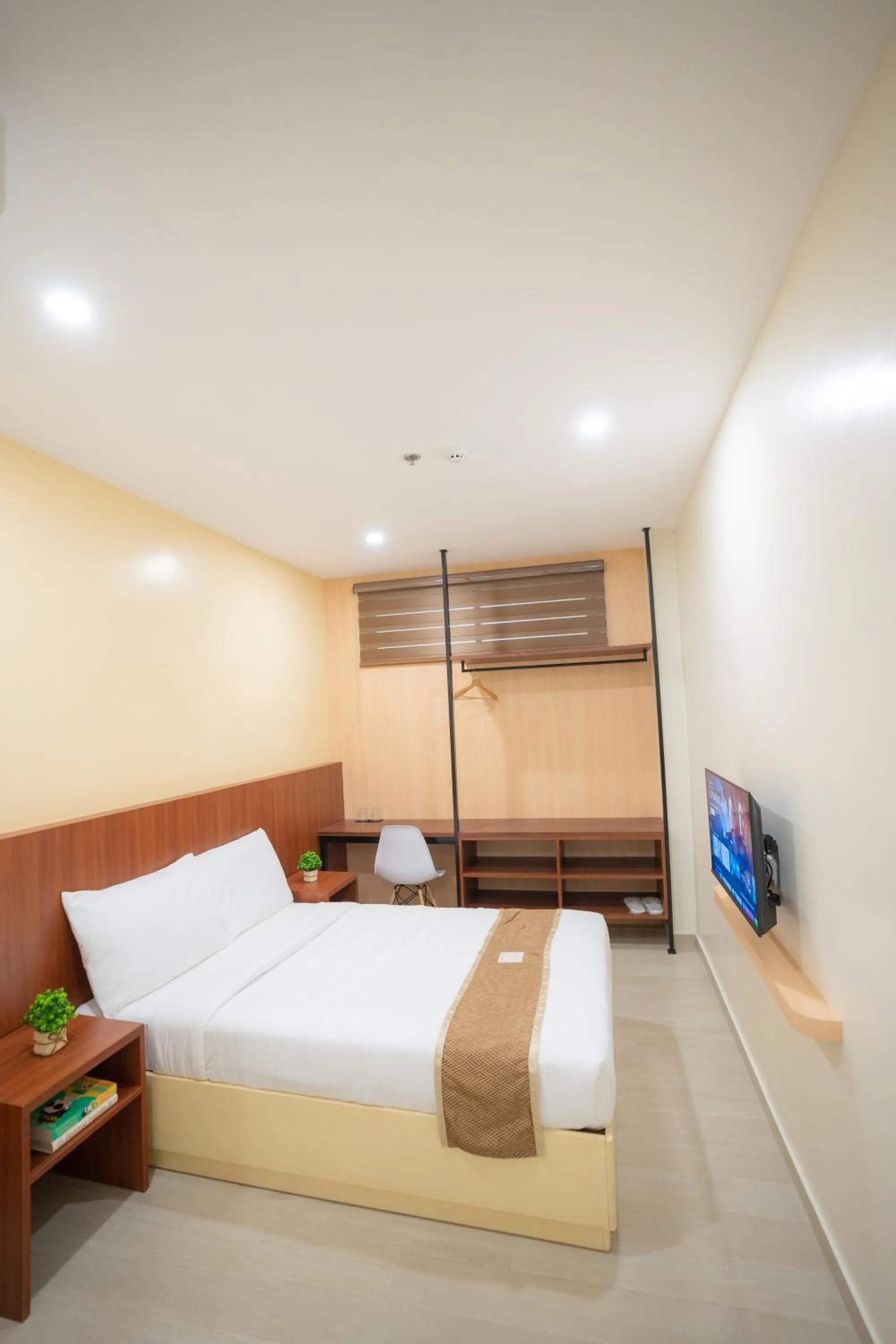 Bed in Sundaze Hotel