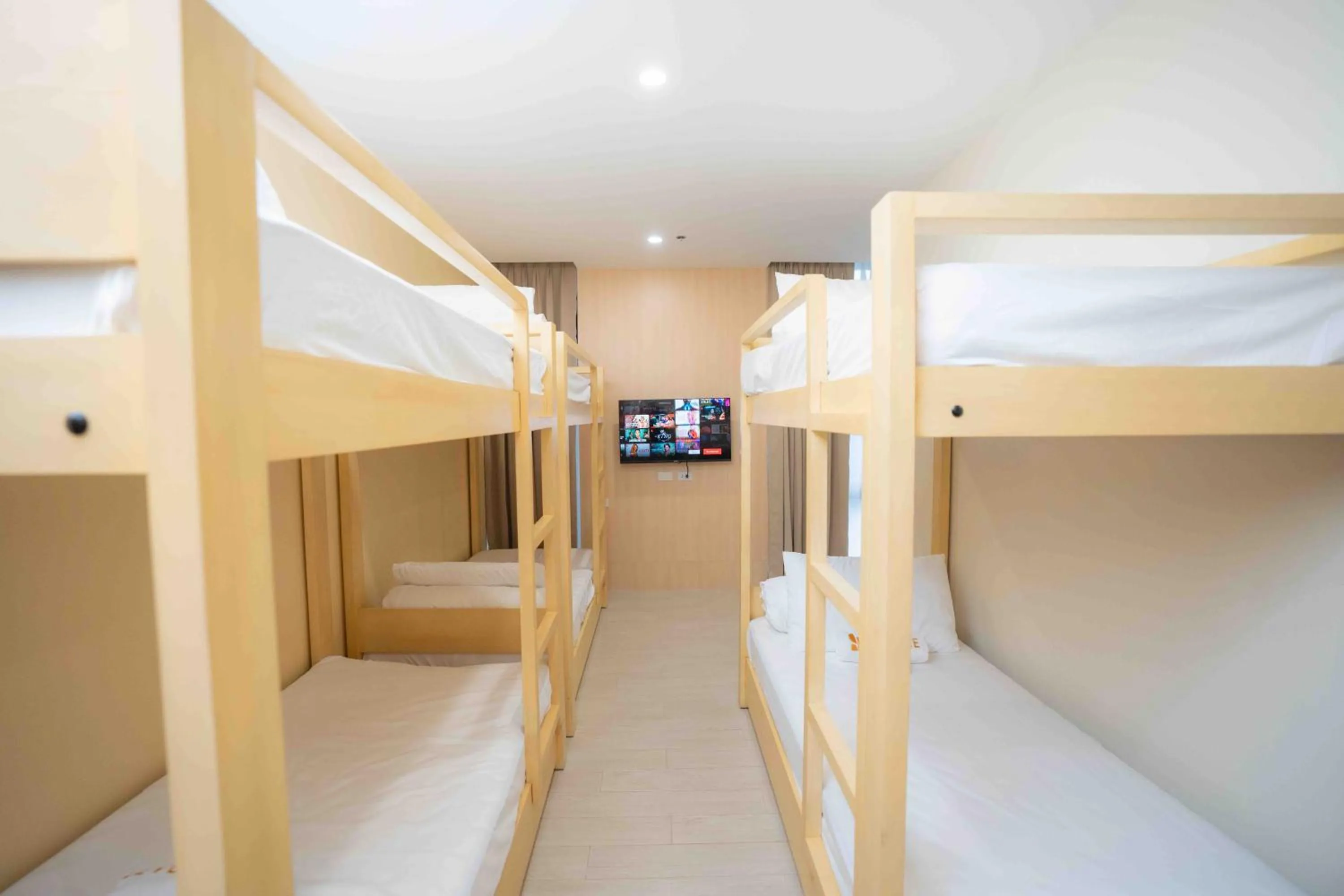 Bed in Sundaze Hotel