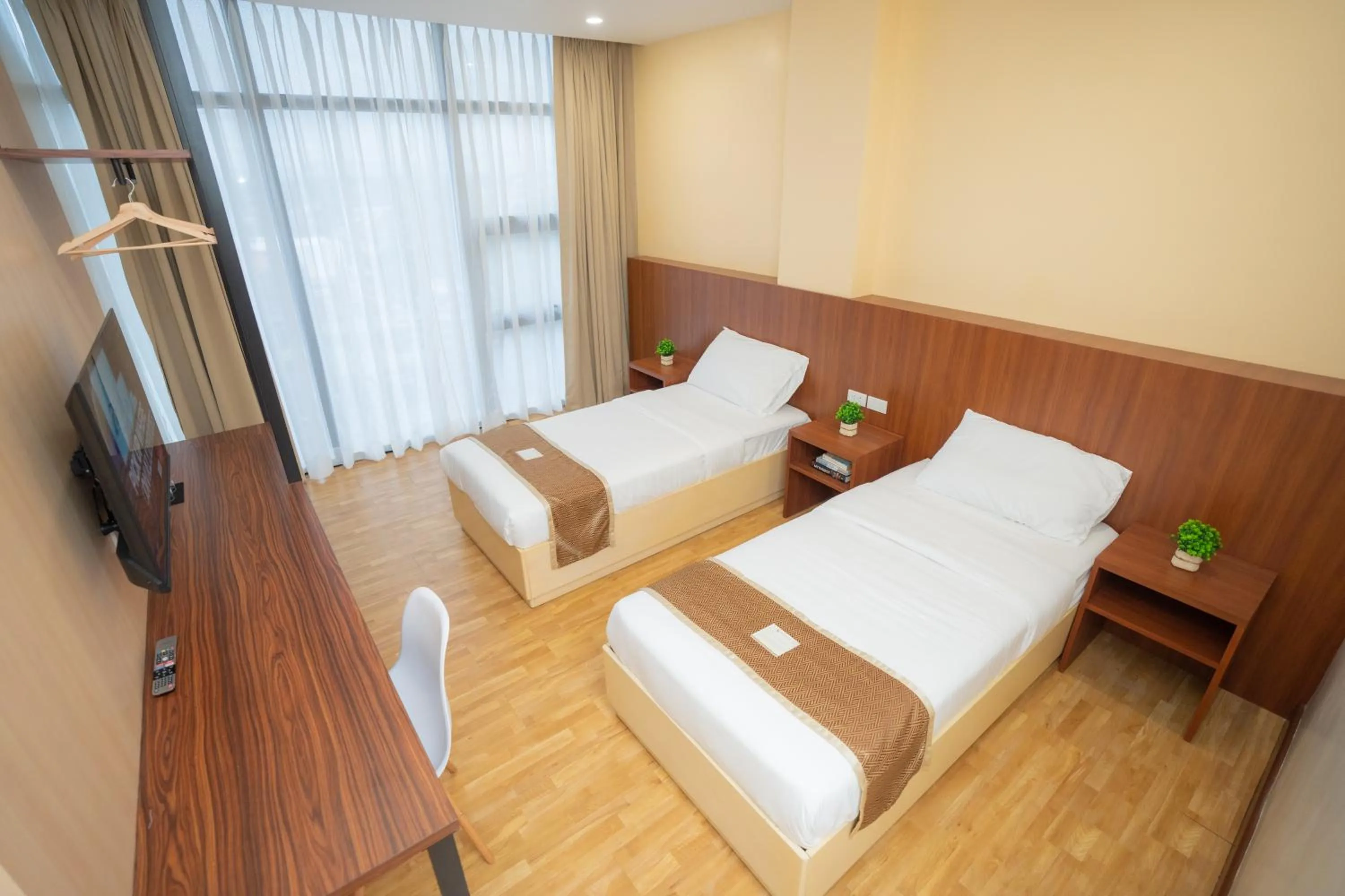 Bed in Sundaze Hotel