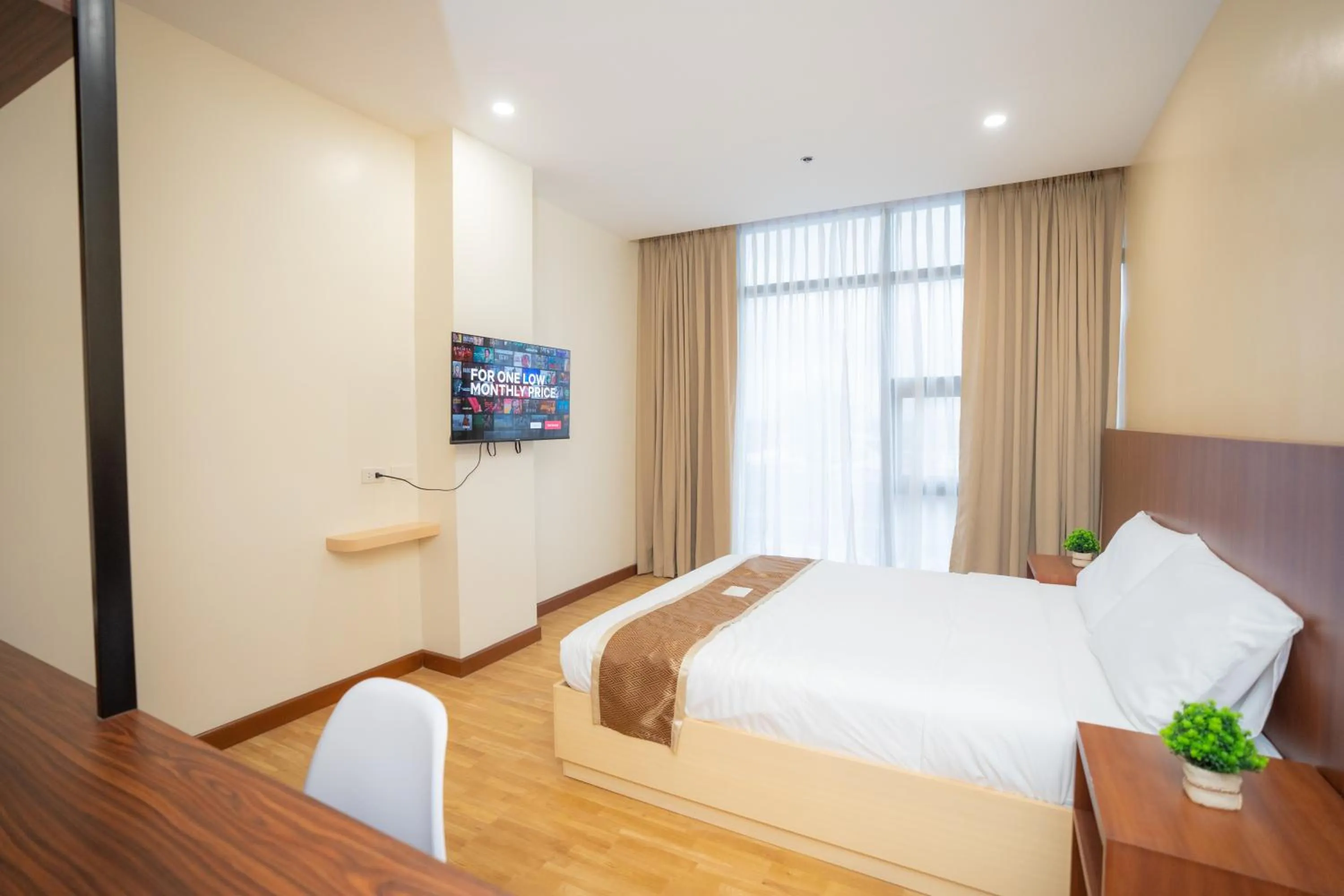 Bed in Sundaze Hotel