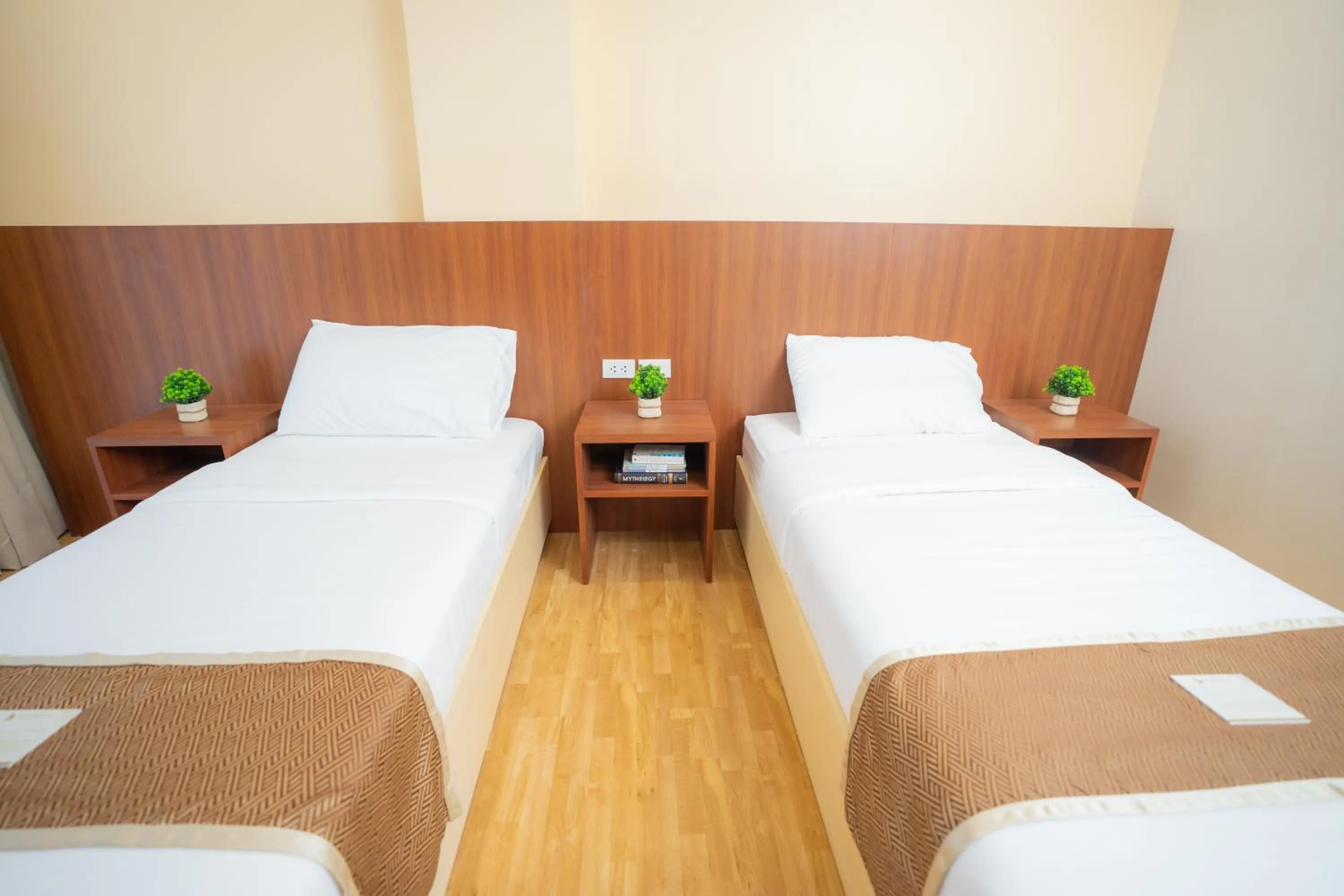 Bed in Sundaze Hotel