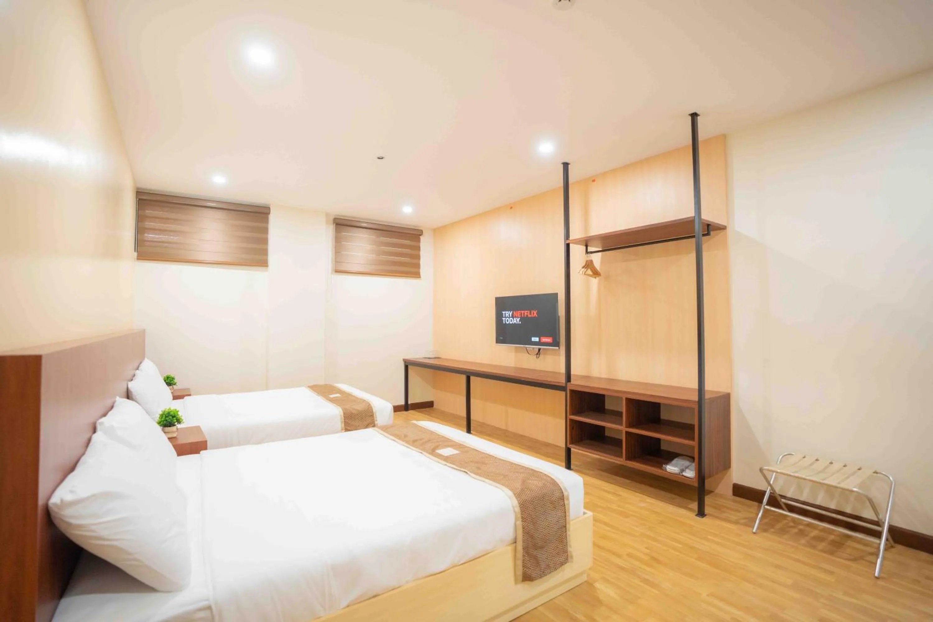 Bed in Sundaze Hotel