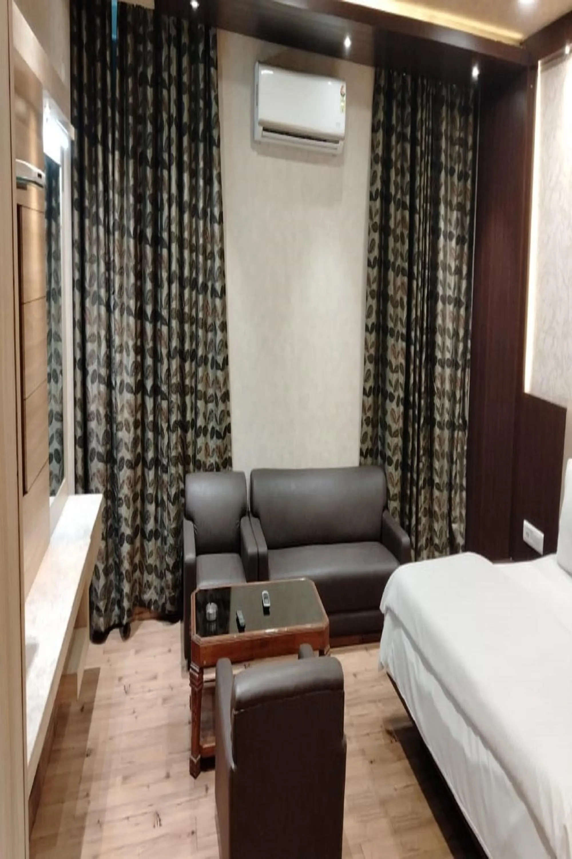 Seating area, Bed in Hotel Park Regency