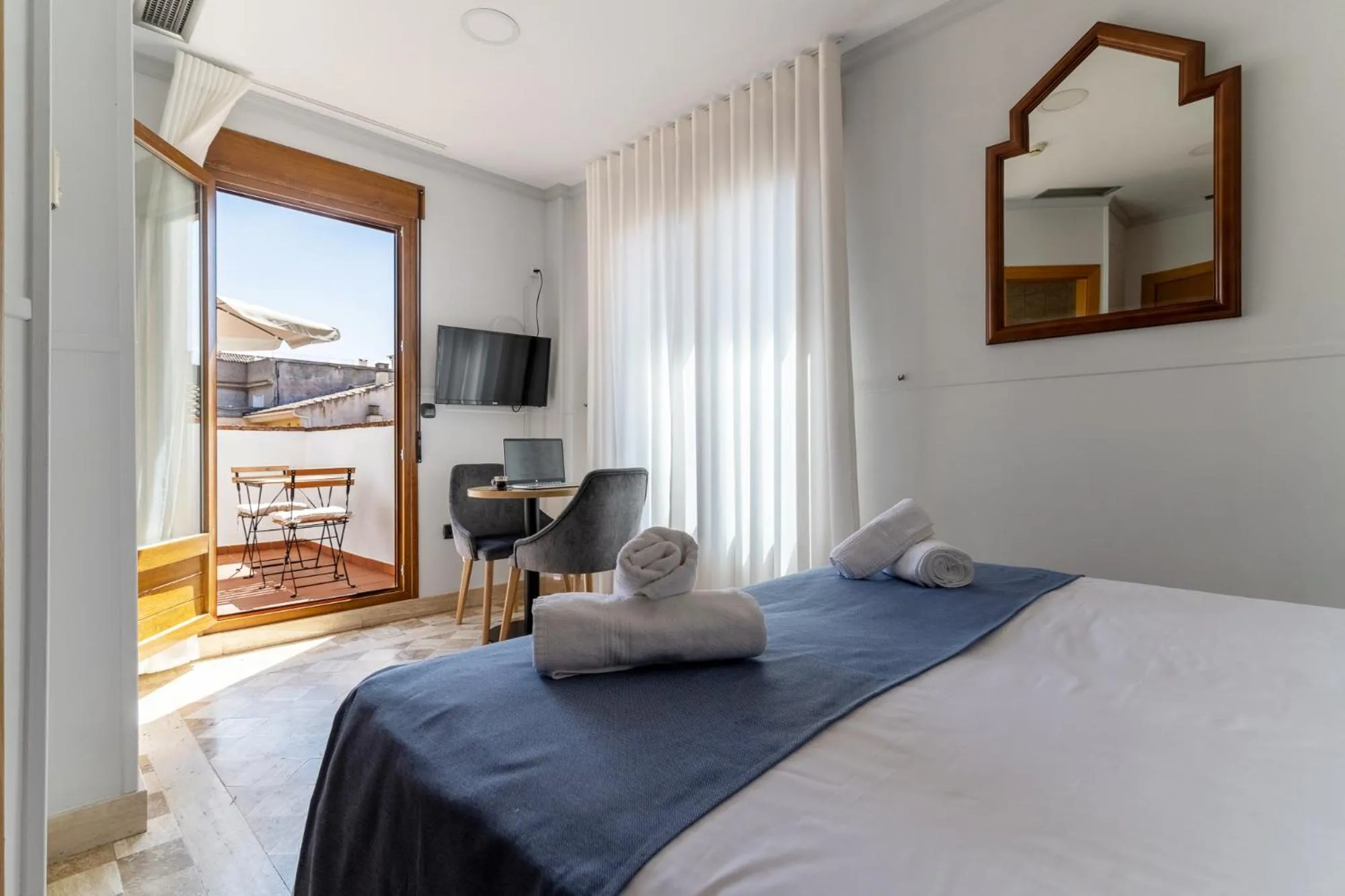 Bed in Hotel Reina Mora