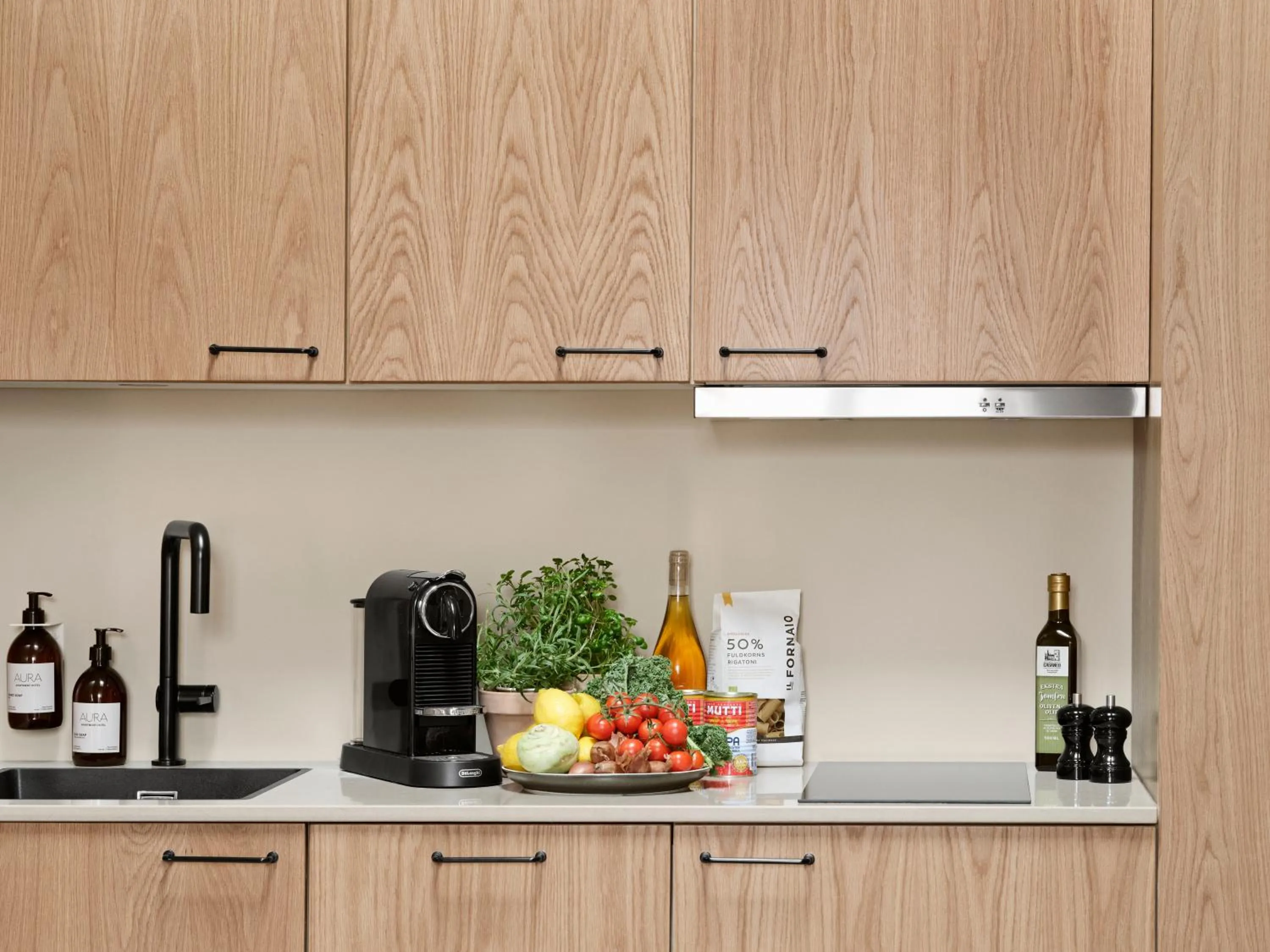 kitchen in Aura Apartment Hotel