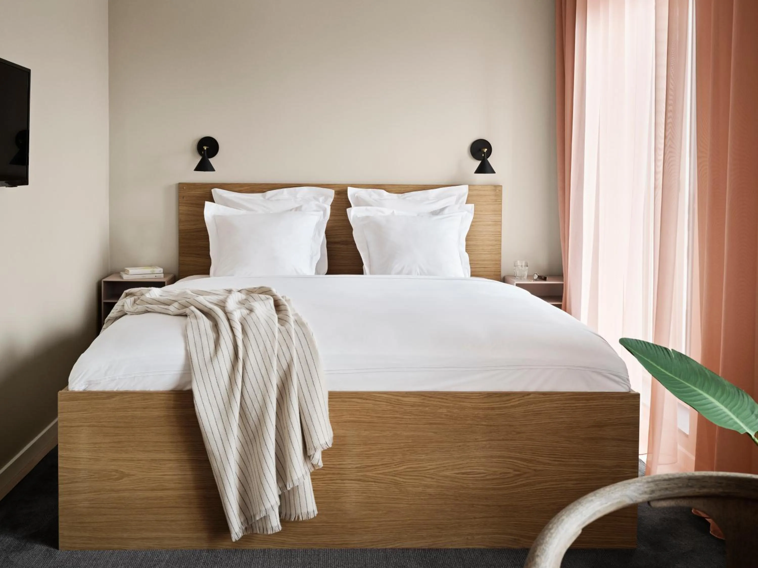 Bed in Aura Apartment Hotel