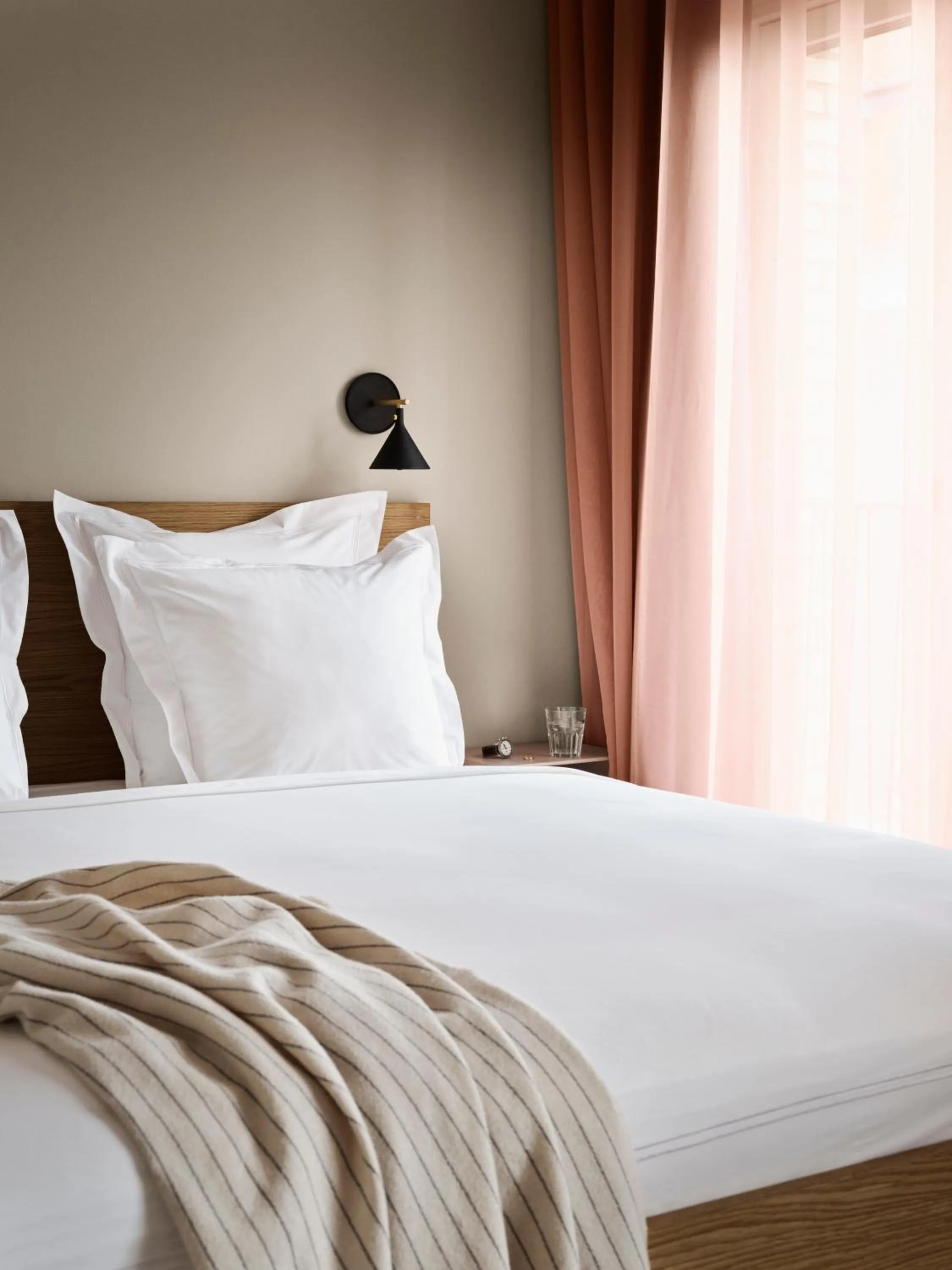 Bed in Aura Apartment Hotel