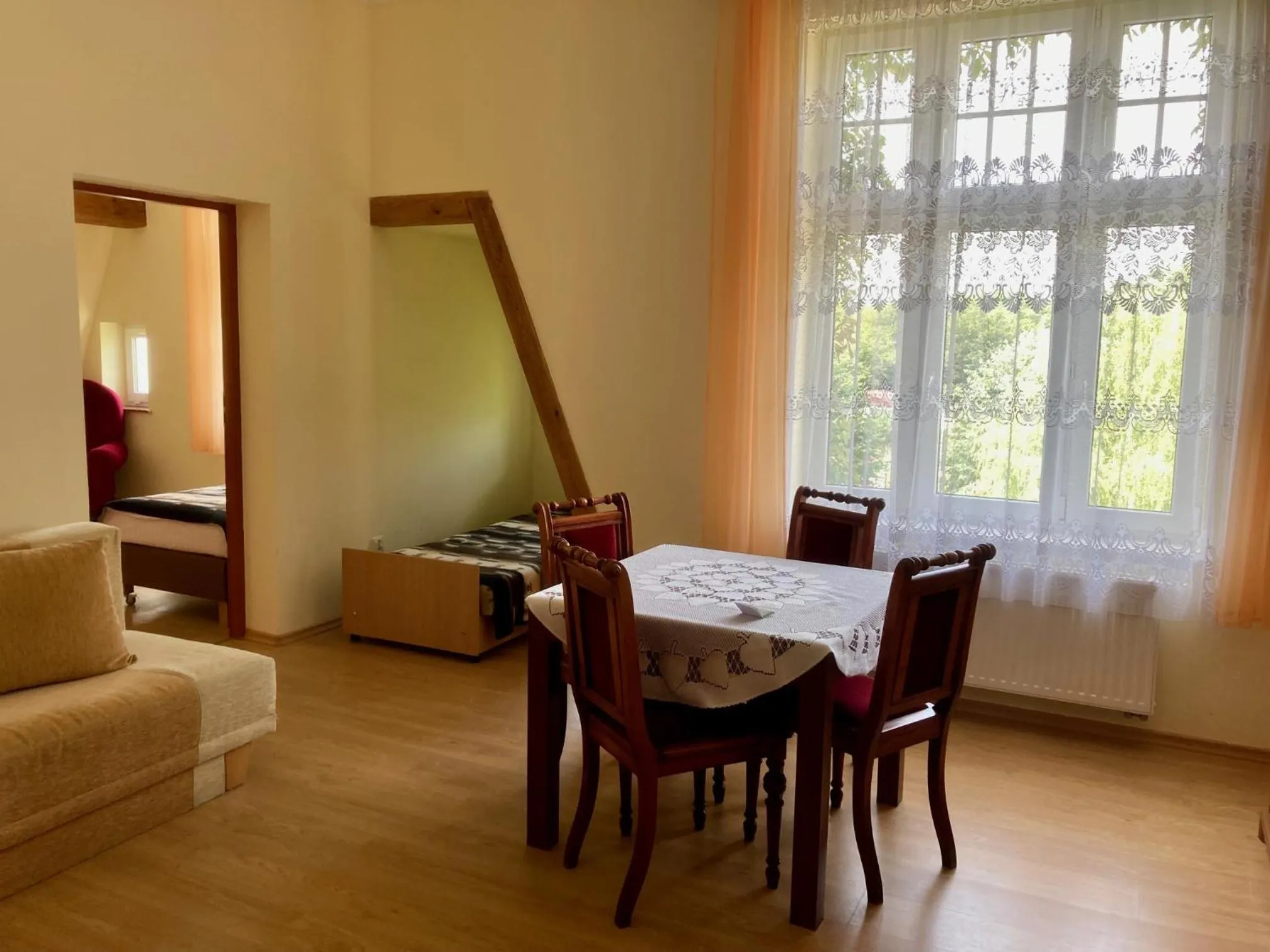 Seating area, Bed in Dom Wypoczynkowy Olivia