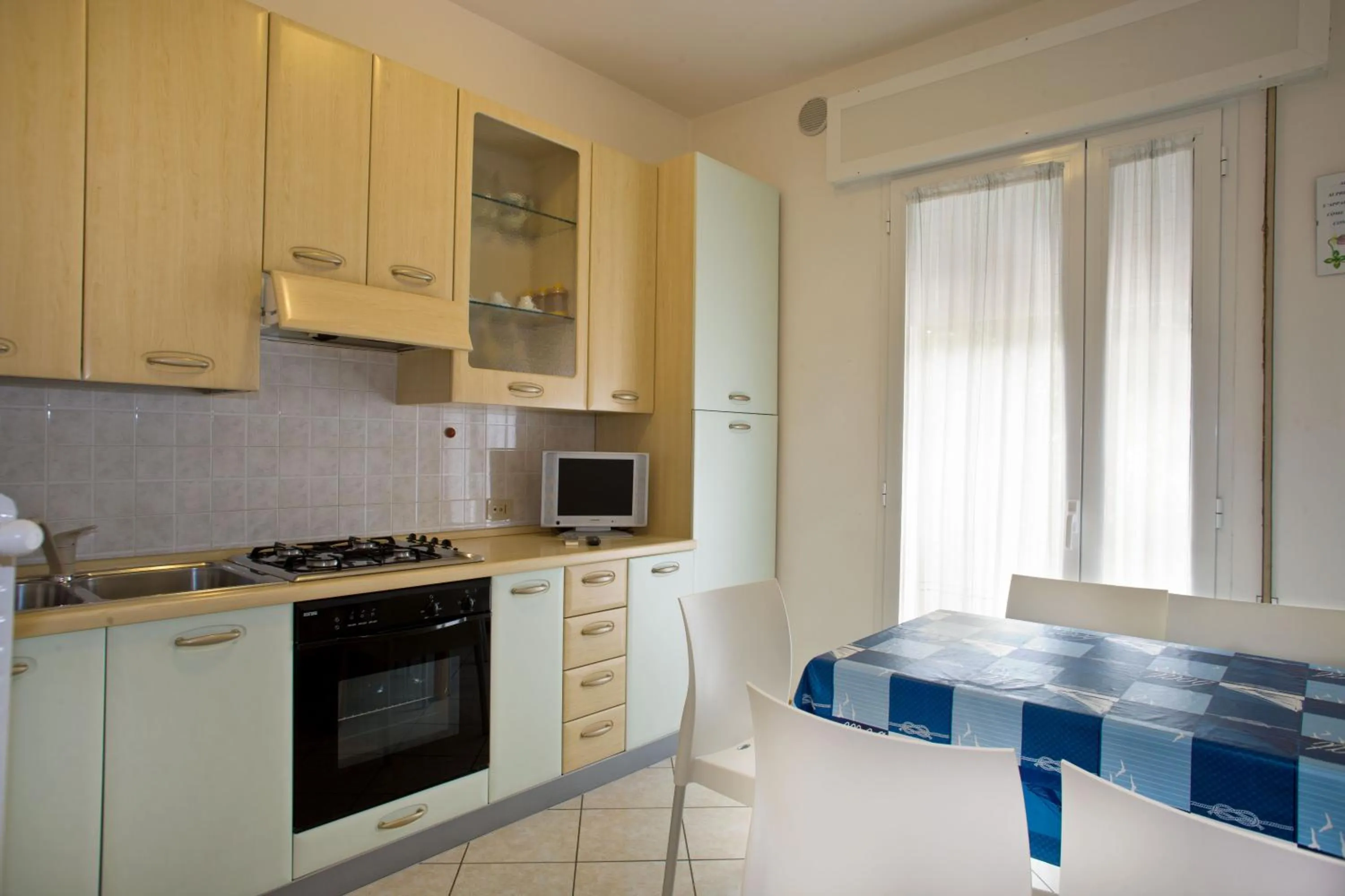 Kitchen or kitchenette in Villa Hanna