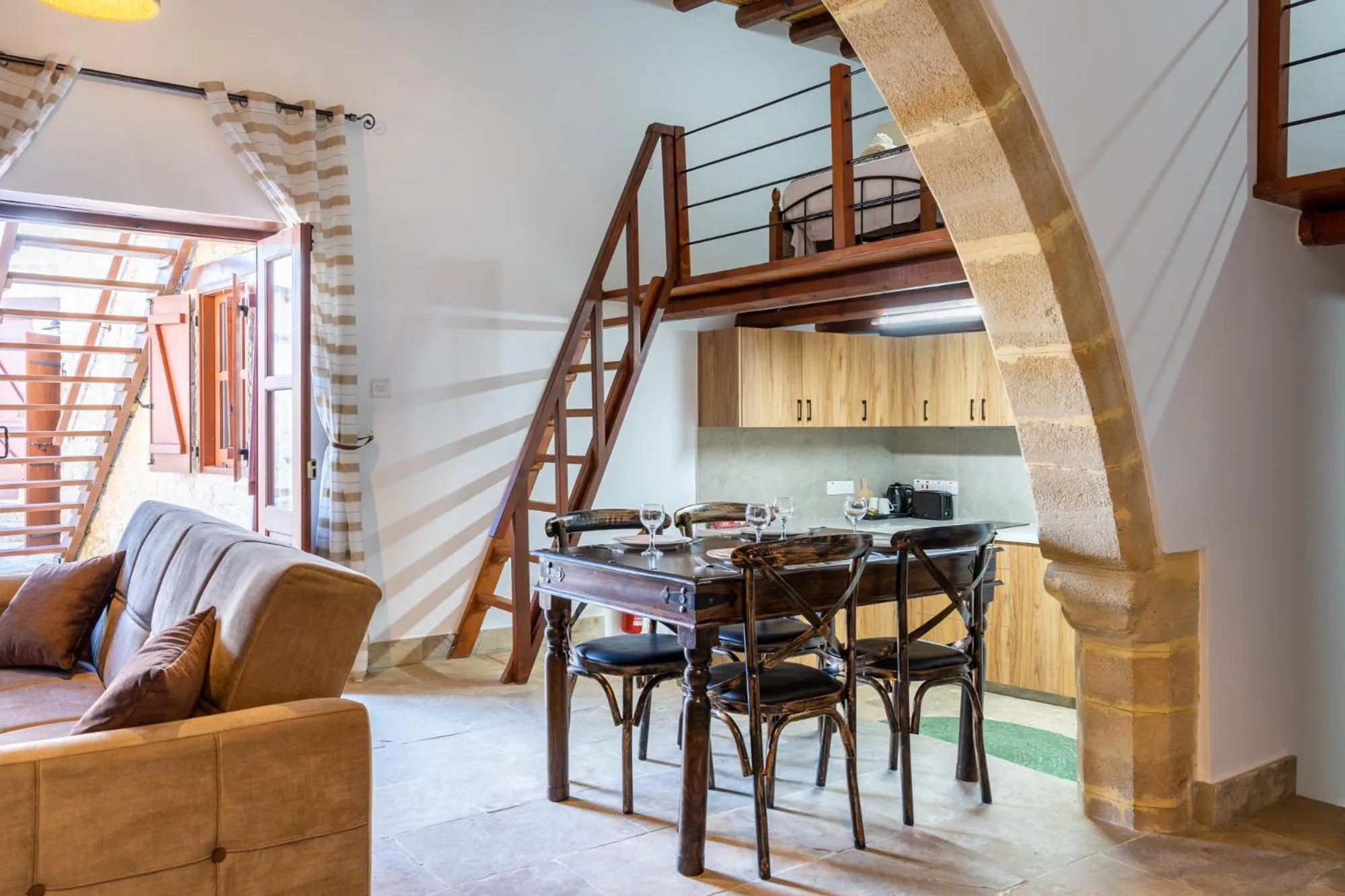 Kitchen or kitchenette in Stone Court Boutique Studios