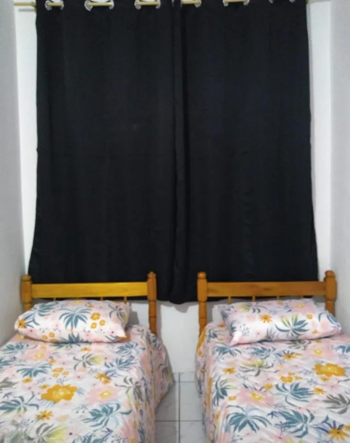 Bed in Pousada Luzemar quarto