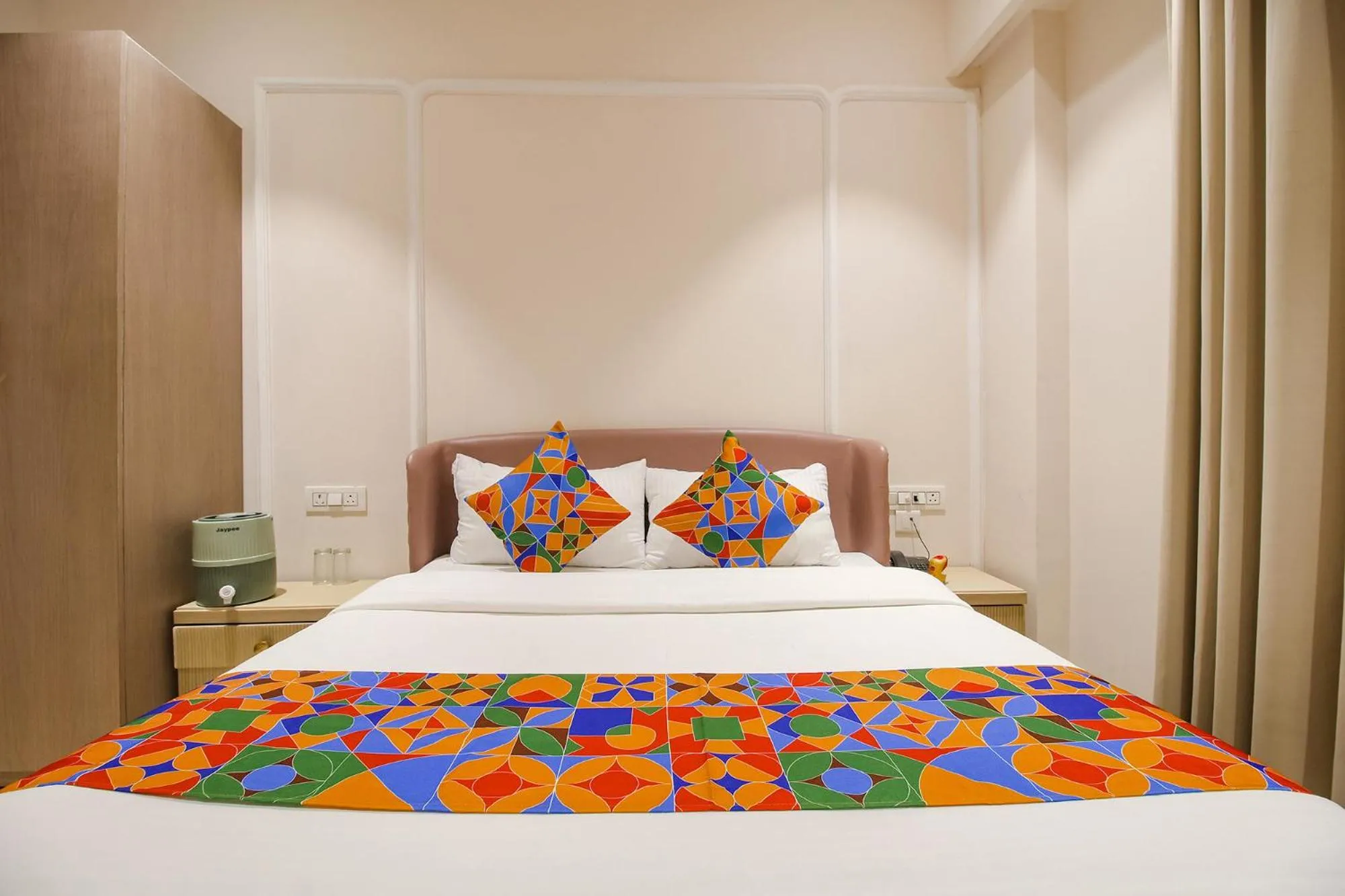 Bed in FabHotel Sharma & Vishnu Garden