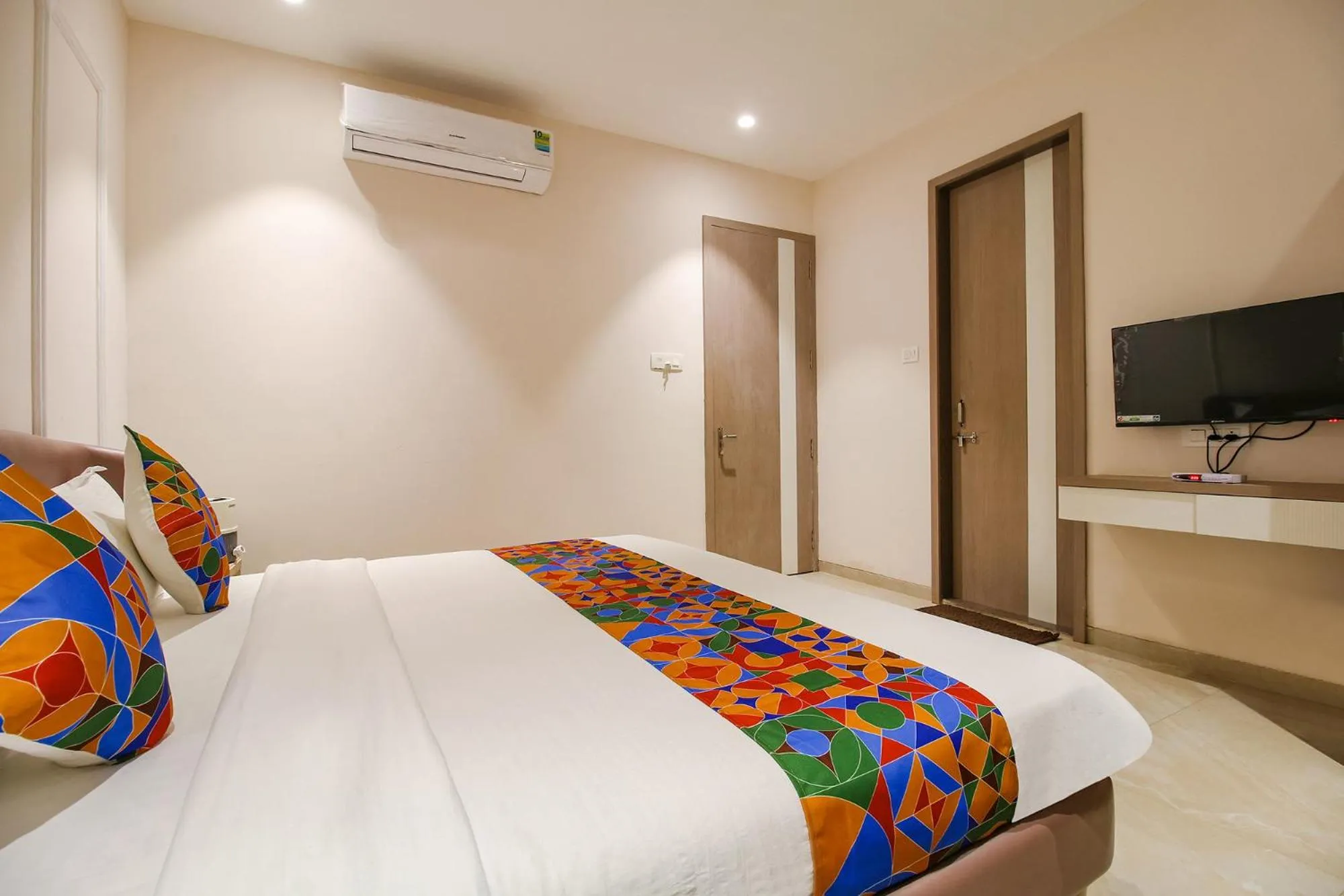 Communal lounge/ TV room, Bed in FabHotel Sharma & Vishnu Garden