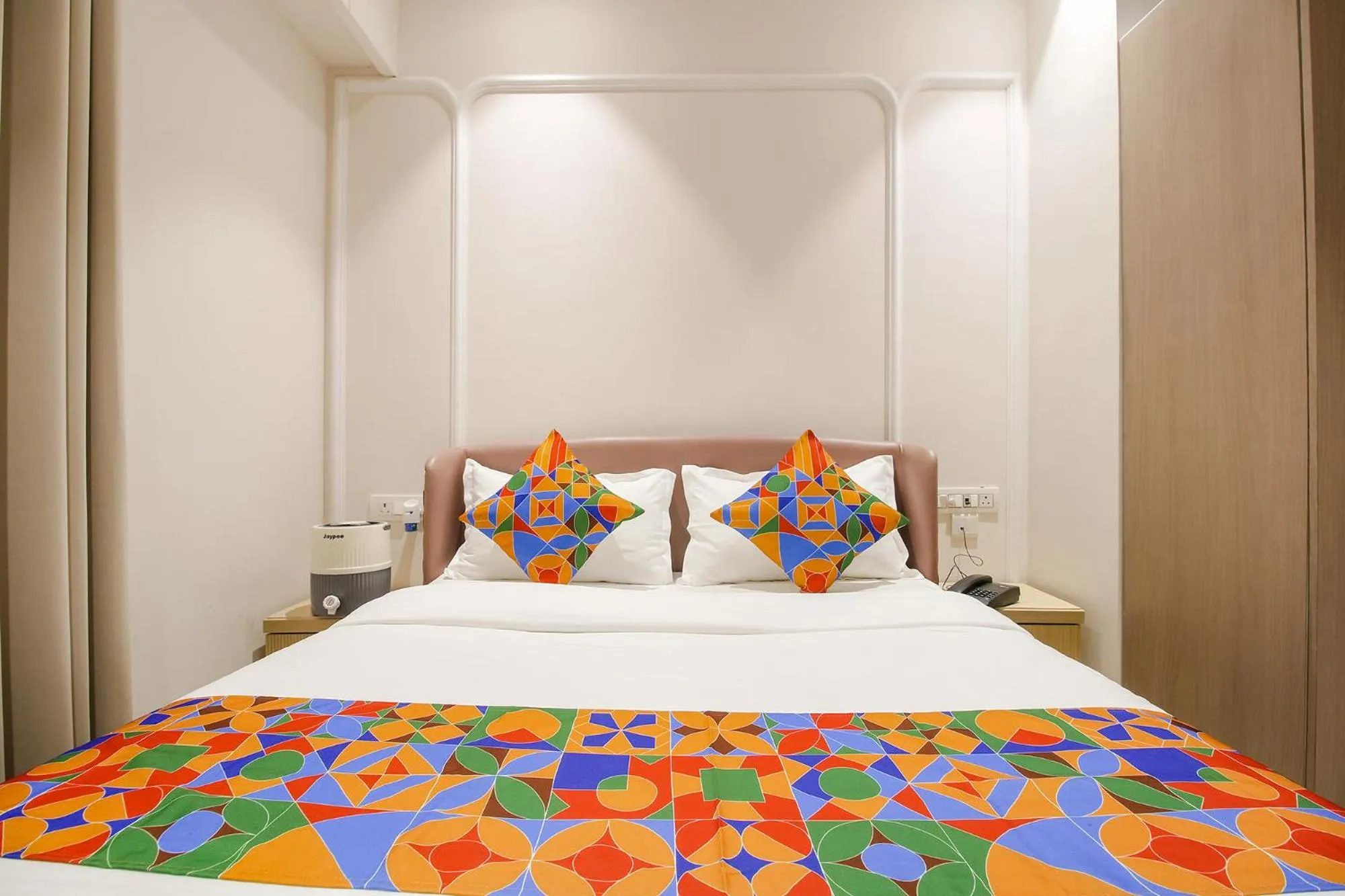 Bed in FabHotel Sharma & Vishnu Garden