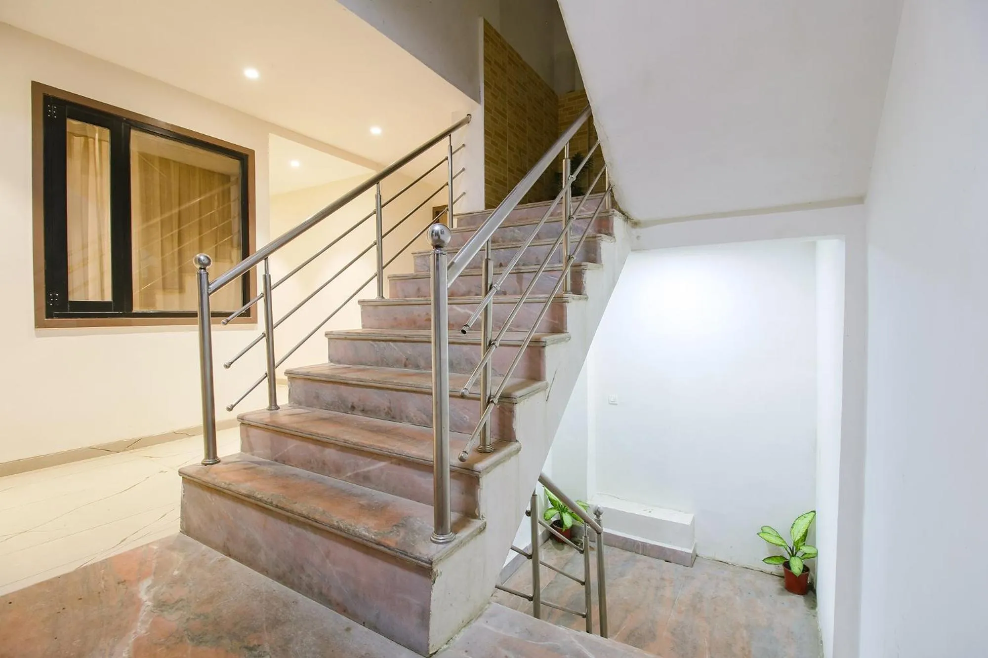 Lobby or reception in FabHotel Sharma & Vishnu Garden