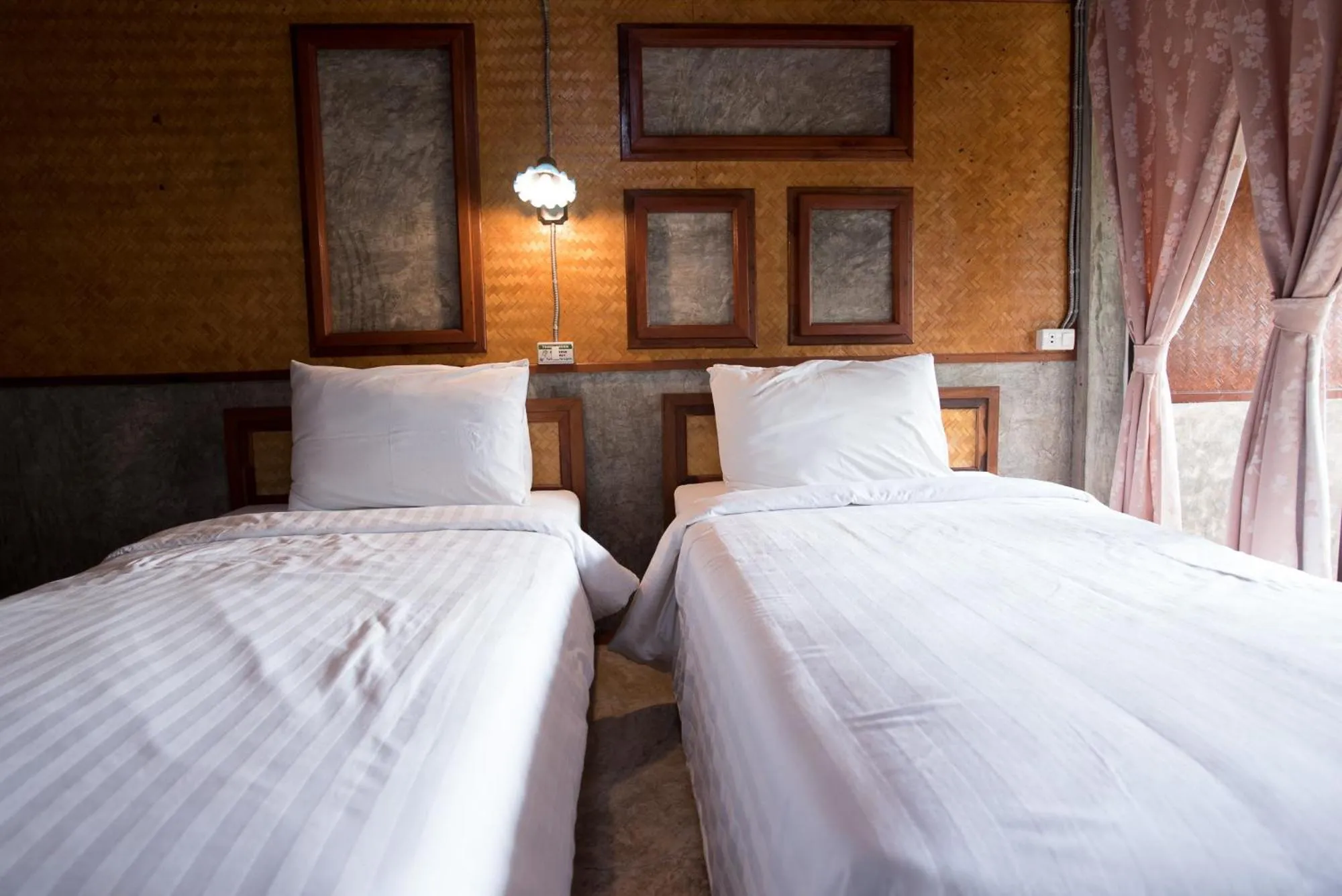 Bed in Herntai Resort Maelanoi