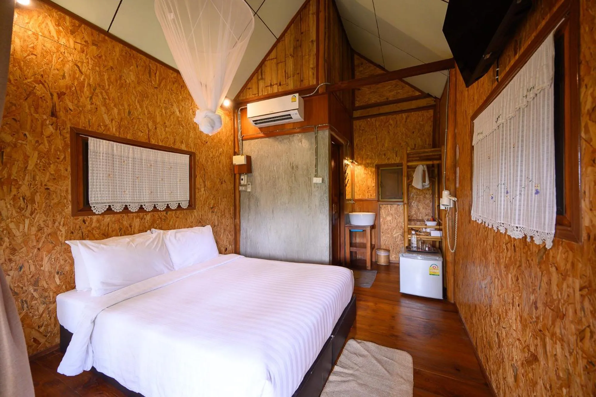 Bed in Herntai Resort Maelanoi