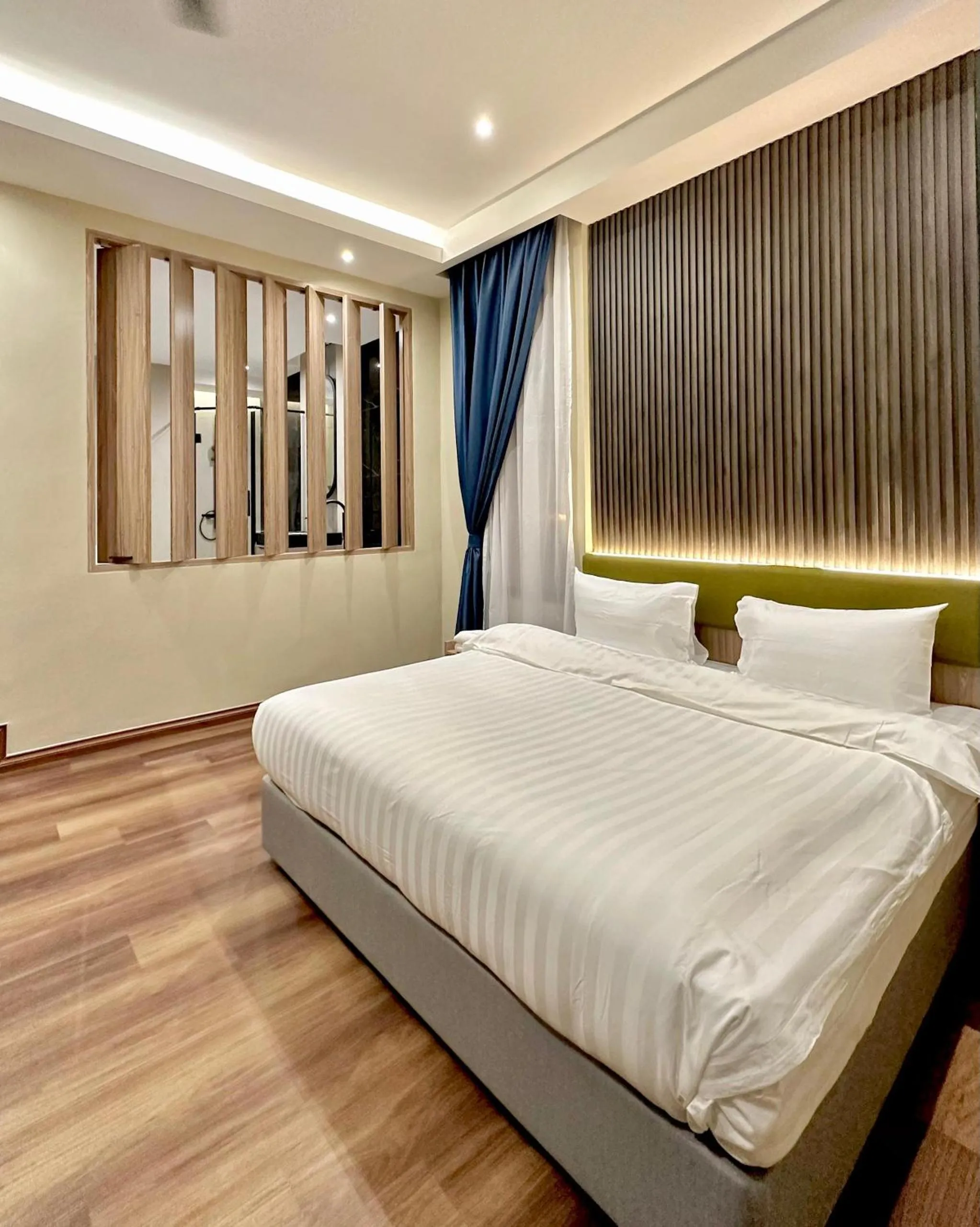 Bed in I-VISTA HOTEL