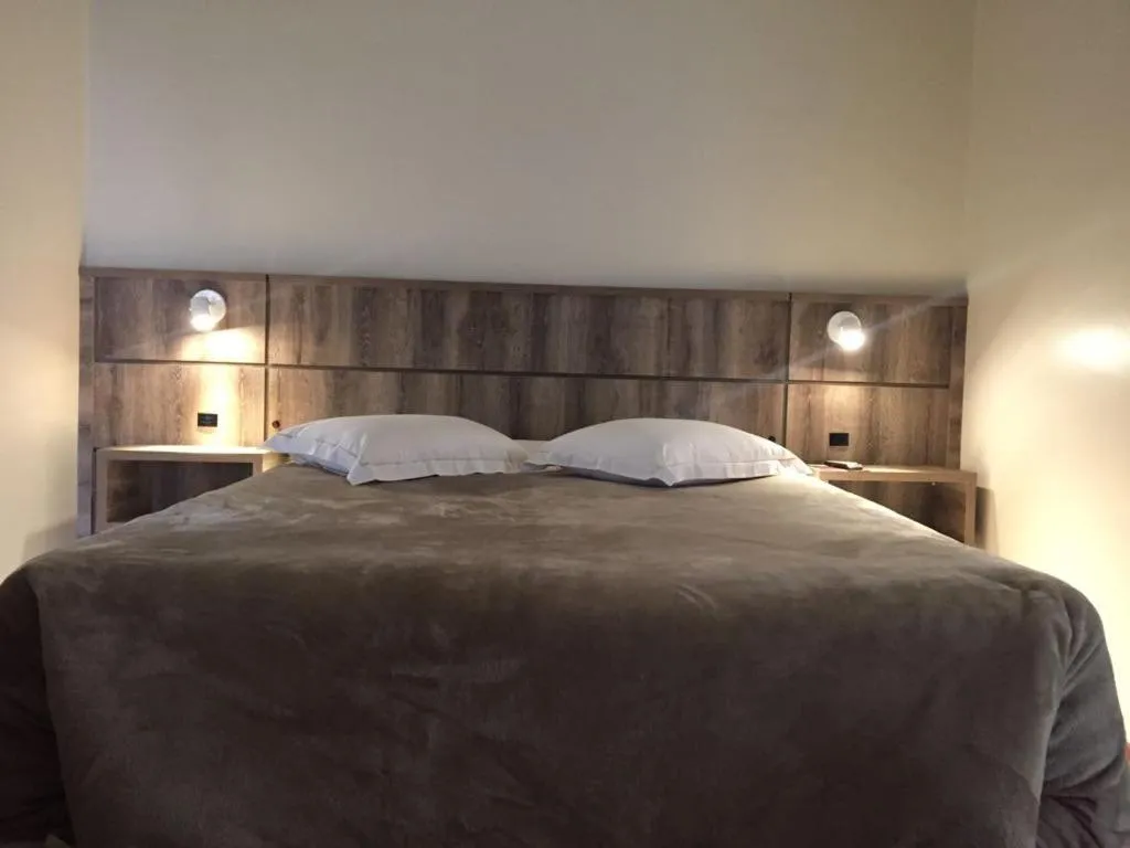 Bed in Villa Apart Hotel