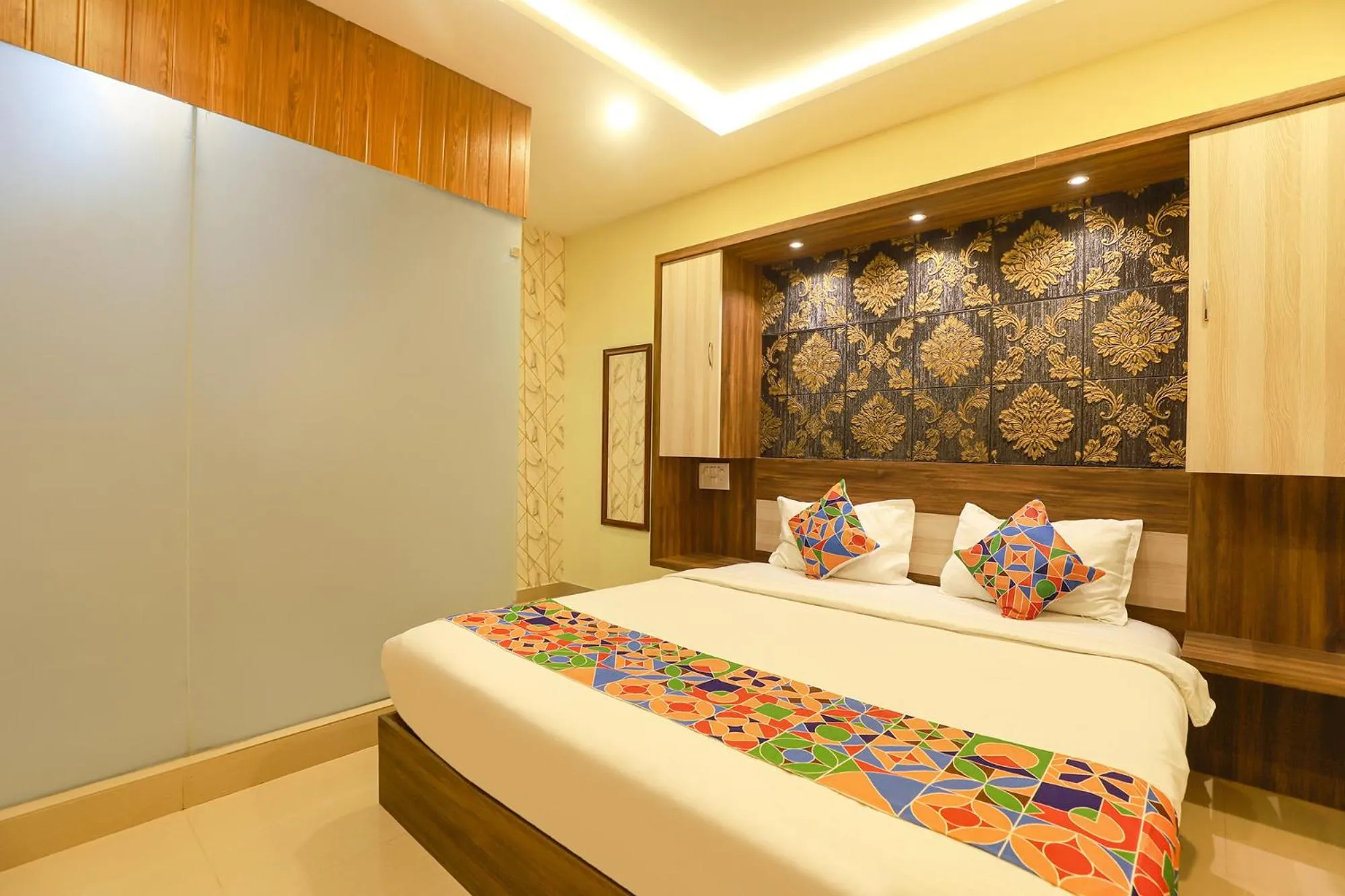Bed in FabHotel Joy Residency