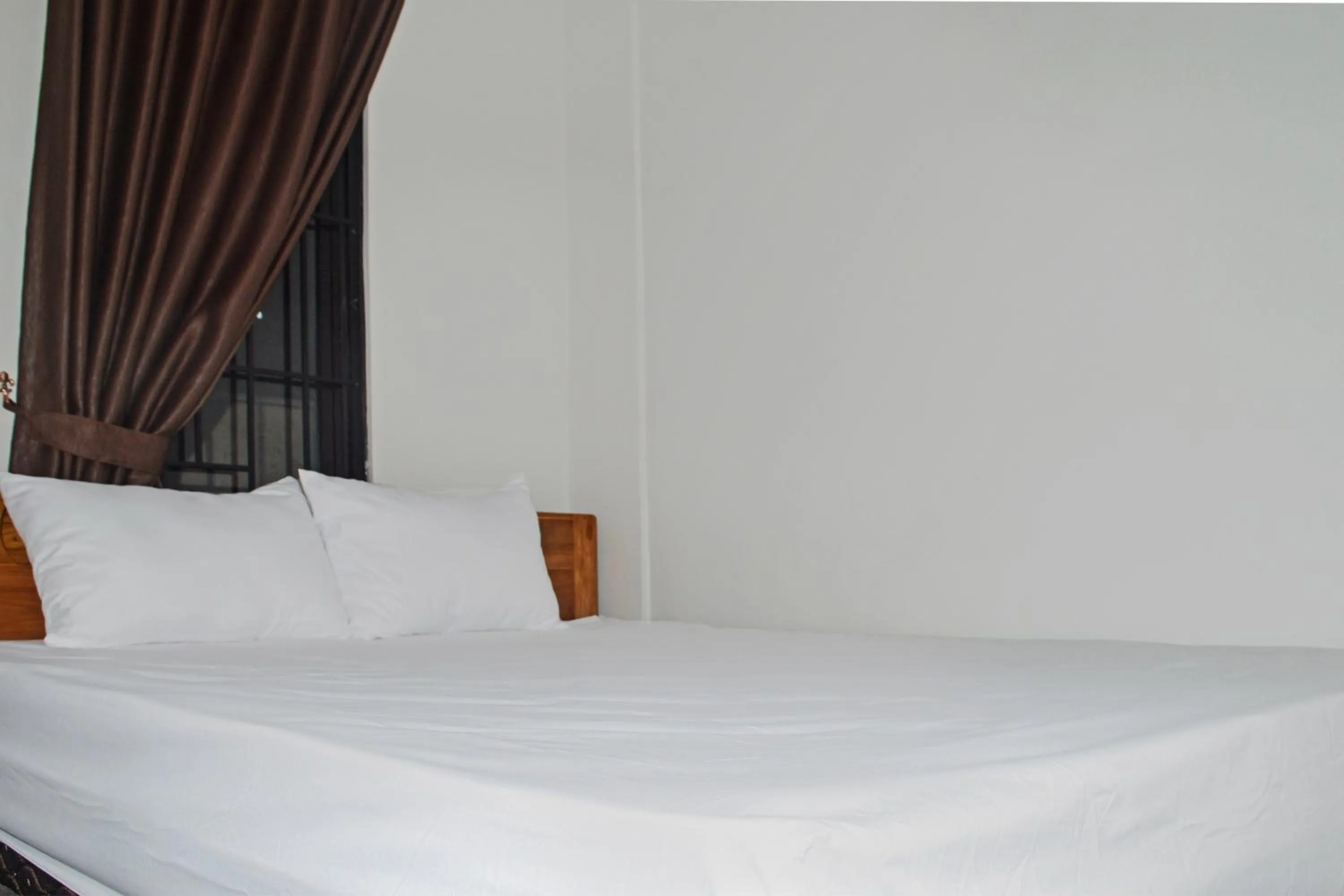 Bedroom in Super OYO 93085 Homy Stay Syariah