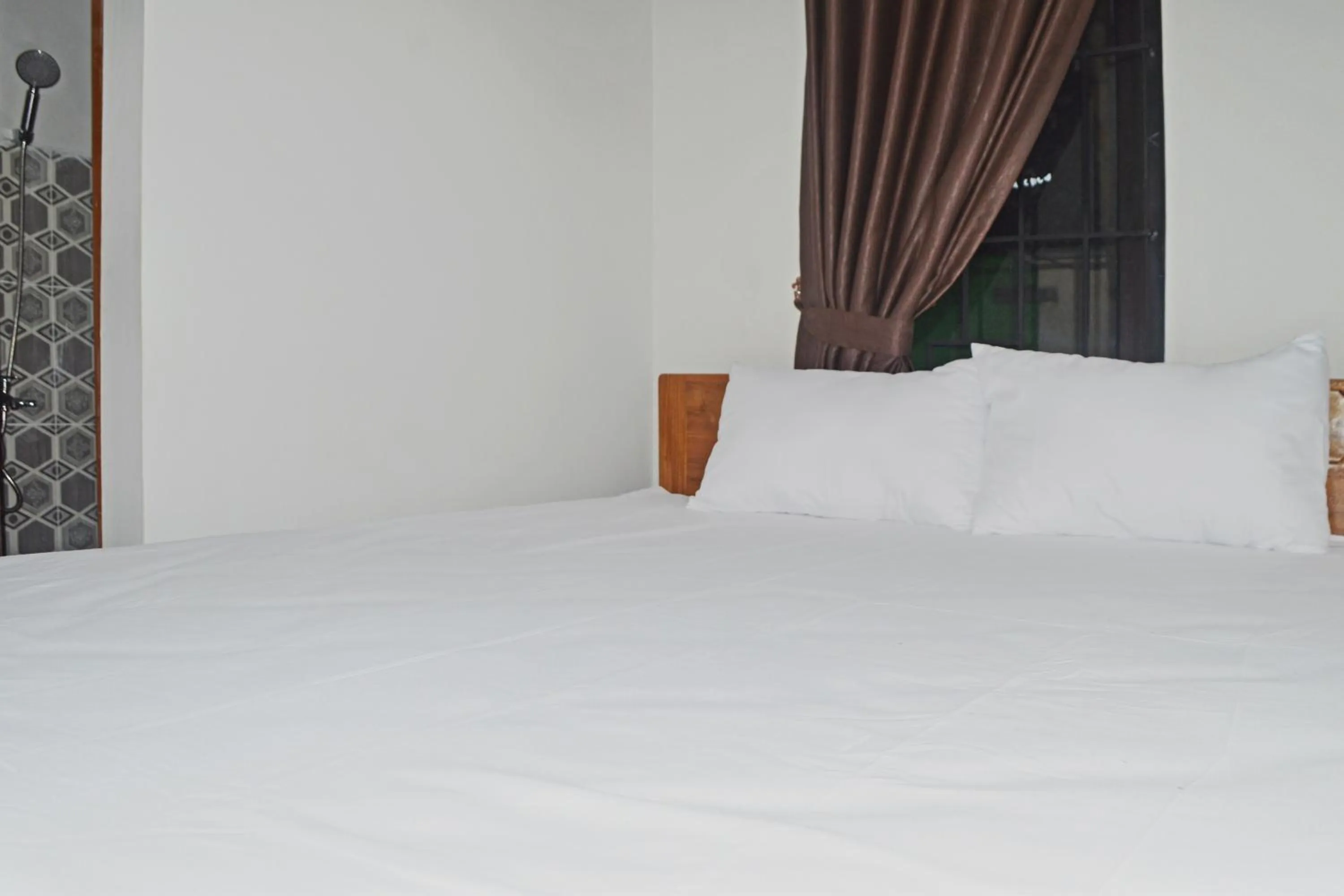 Bedroom in Super OYO 93085 Homy Stay Syariah