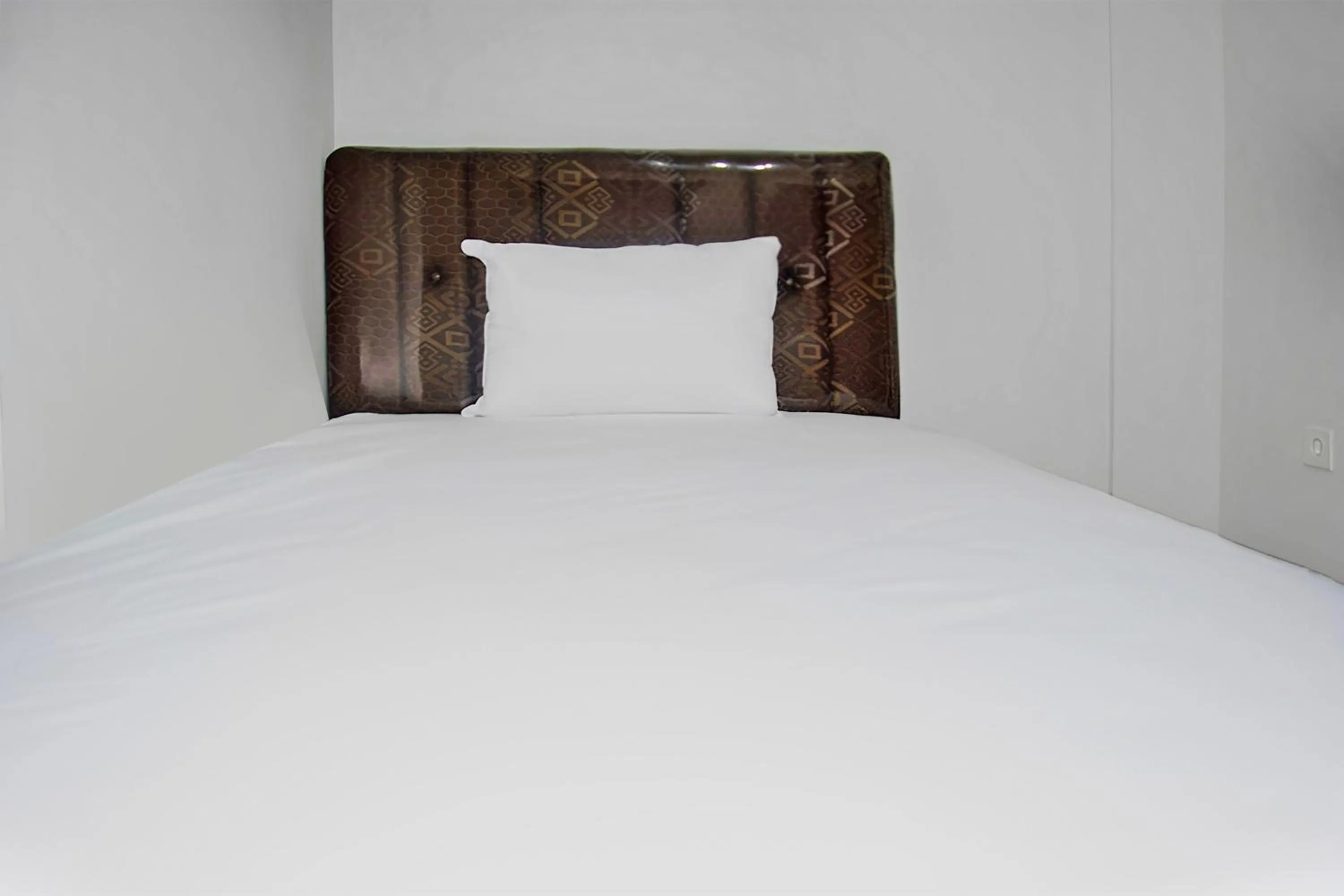 Bedroom in Super OYO 93085 Homy Stay Syariah