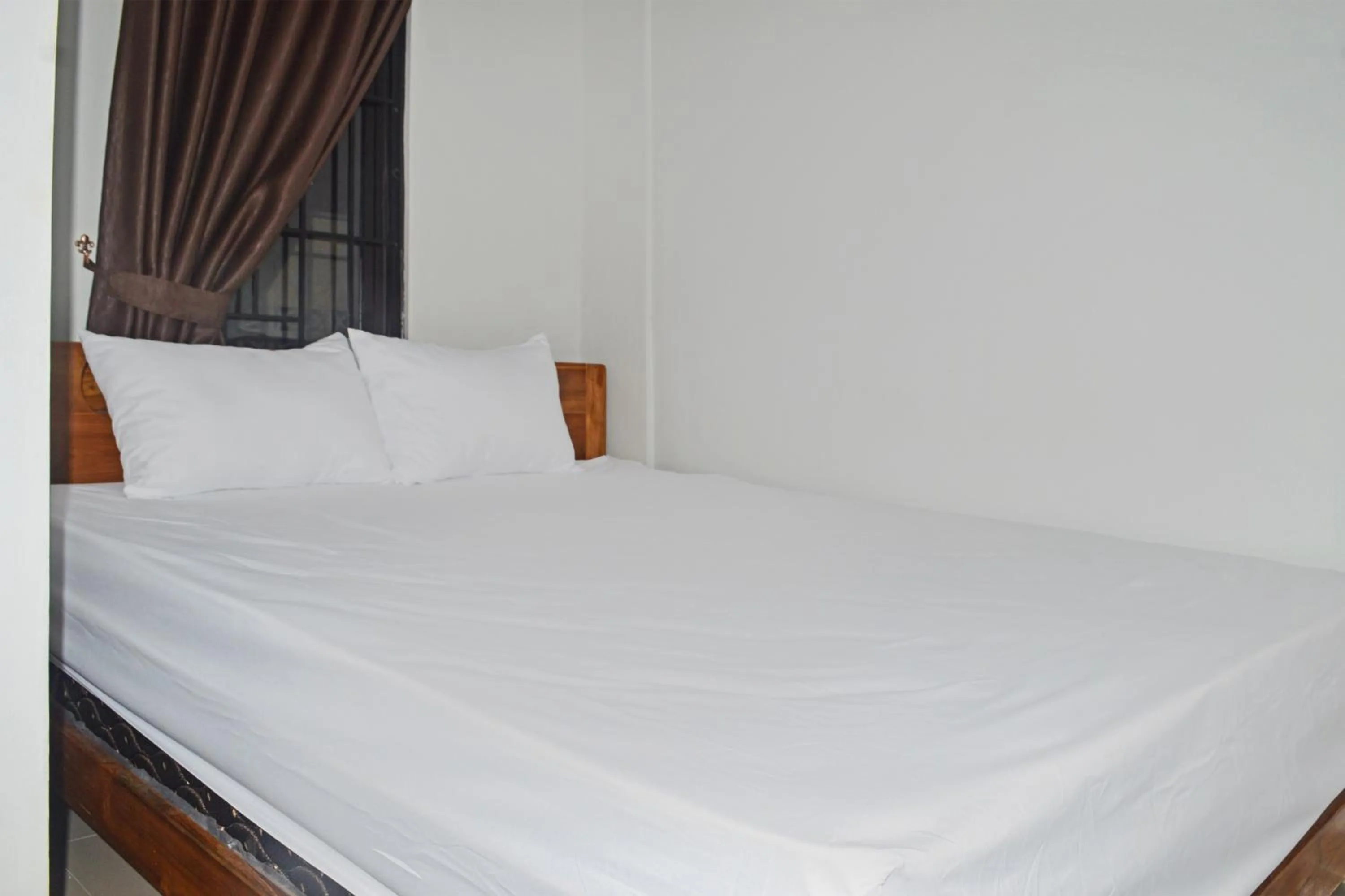 Bedroom in Super OYO 93085 Homy Stay Syariah