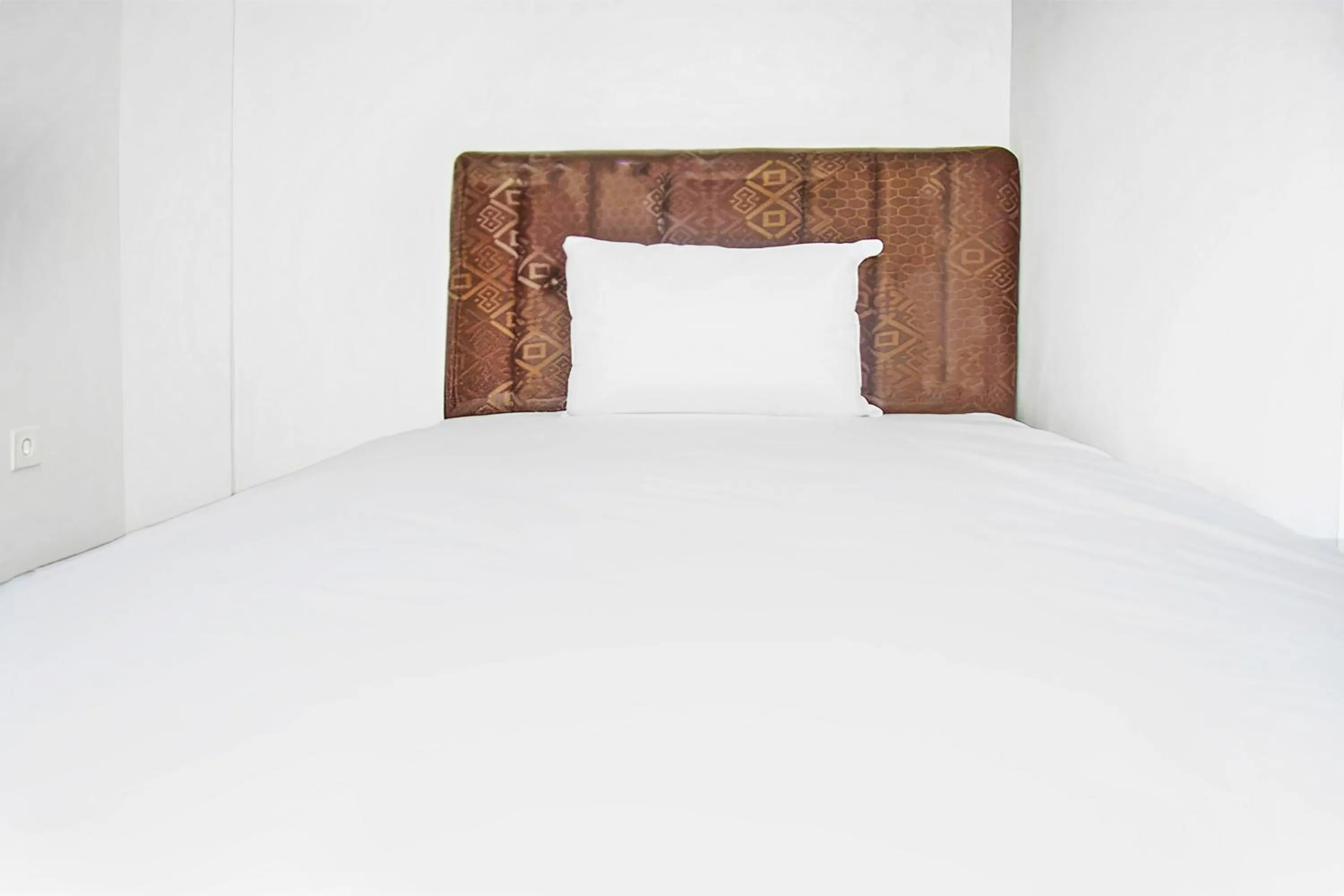 Bedroom in Super OYO 93085 Homy Stay Syariah