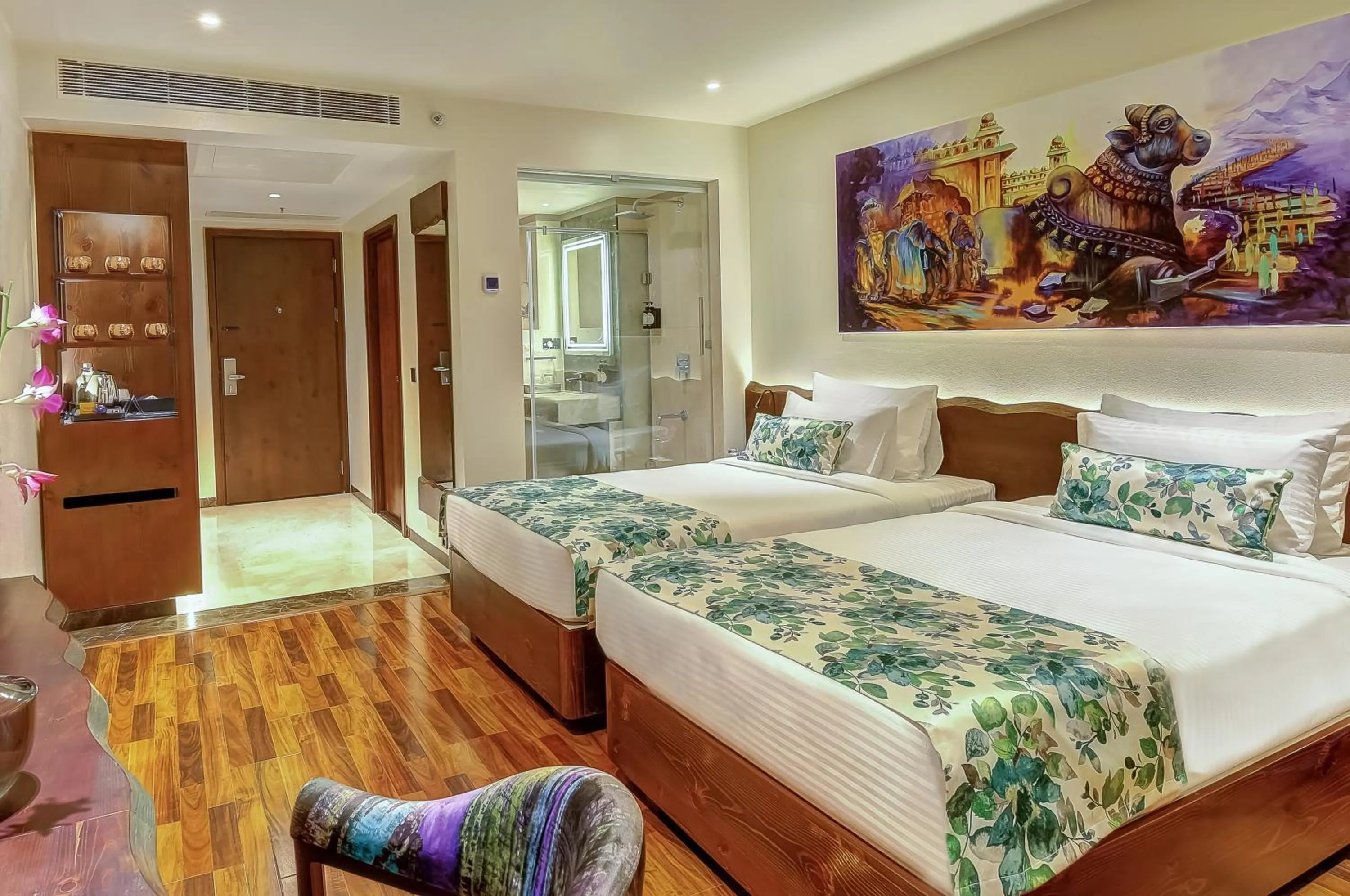 Photo of the whole room, Bed in Regenta Central Javaji Mysore