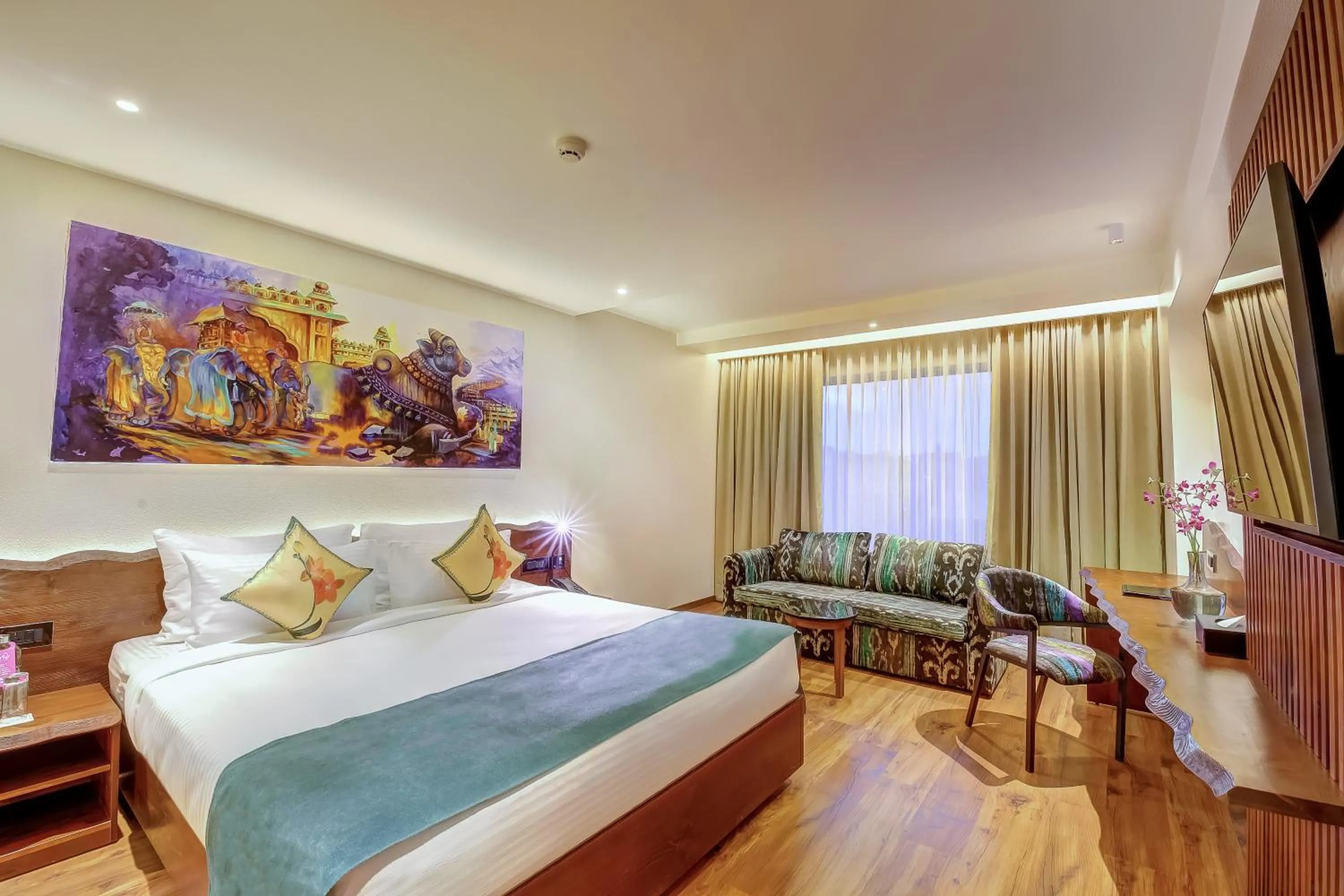 Photo of the whole room, Bed in Regenta Central Javaji Mysore