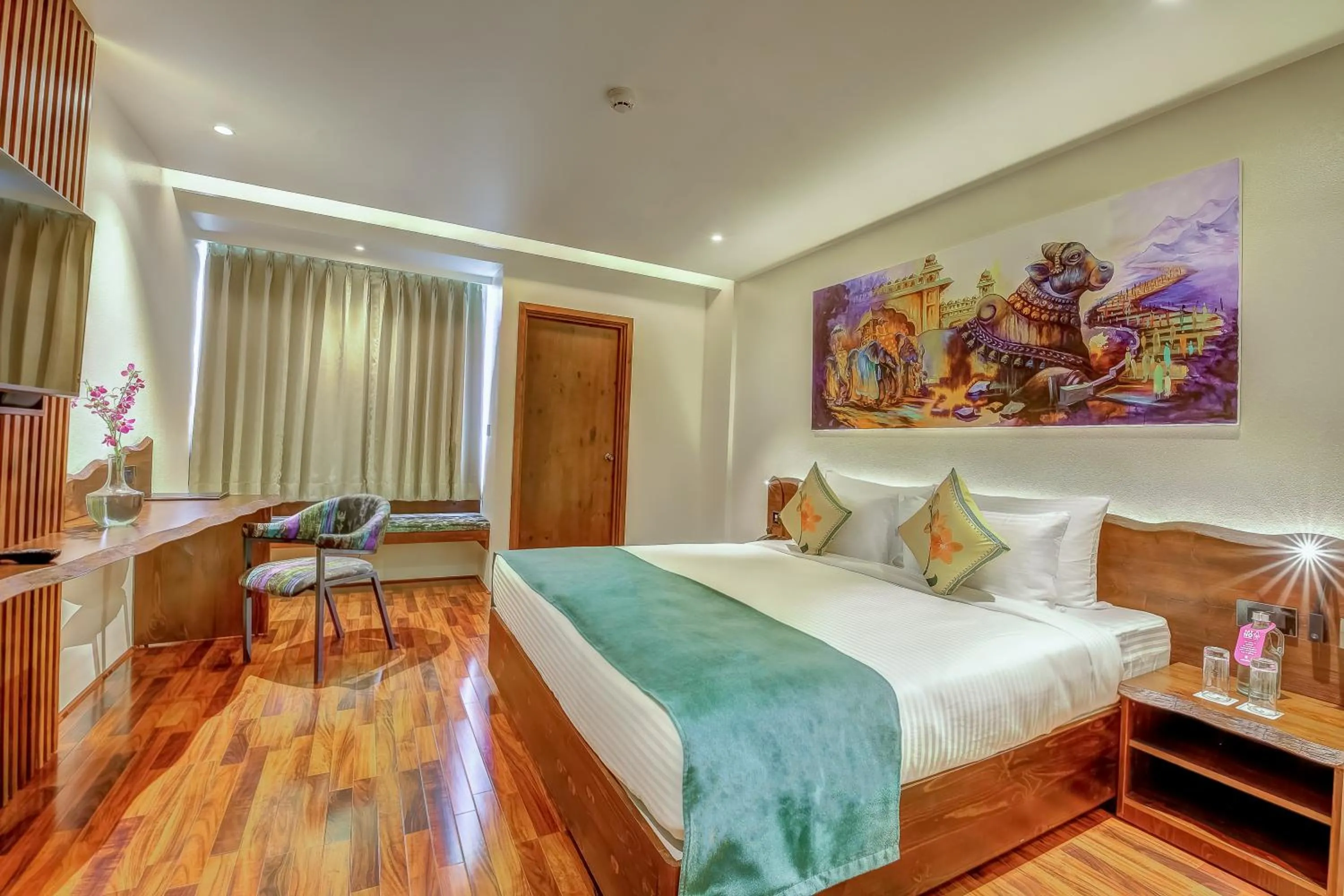 Photo of the whole room, Bed in Regenta Central Javaji Mysore