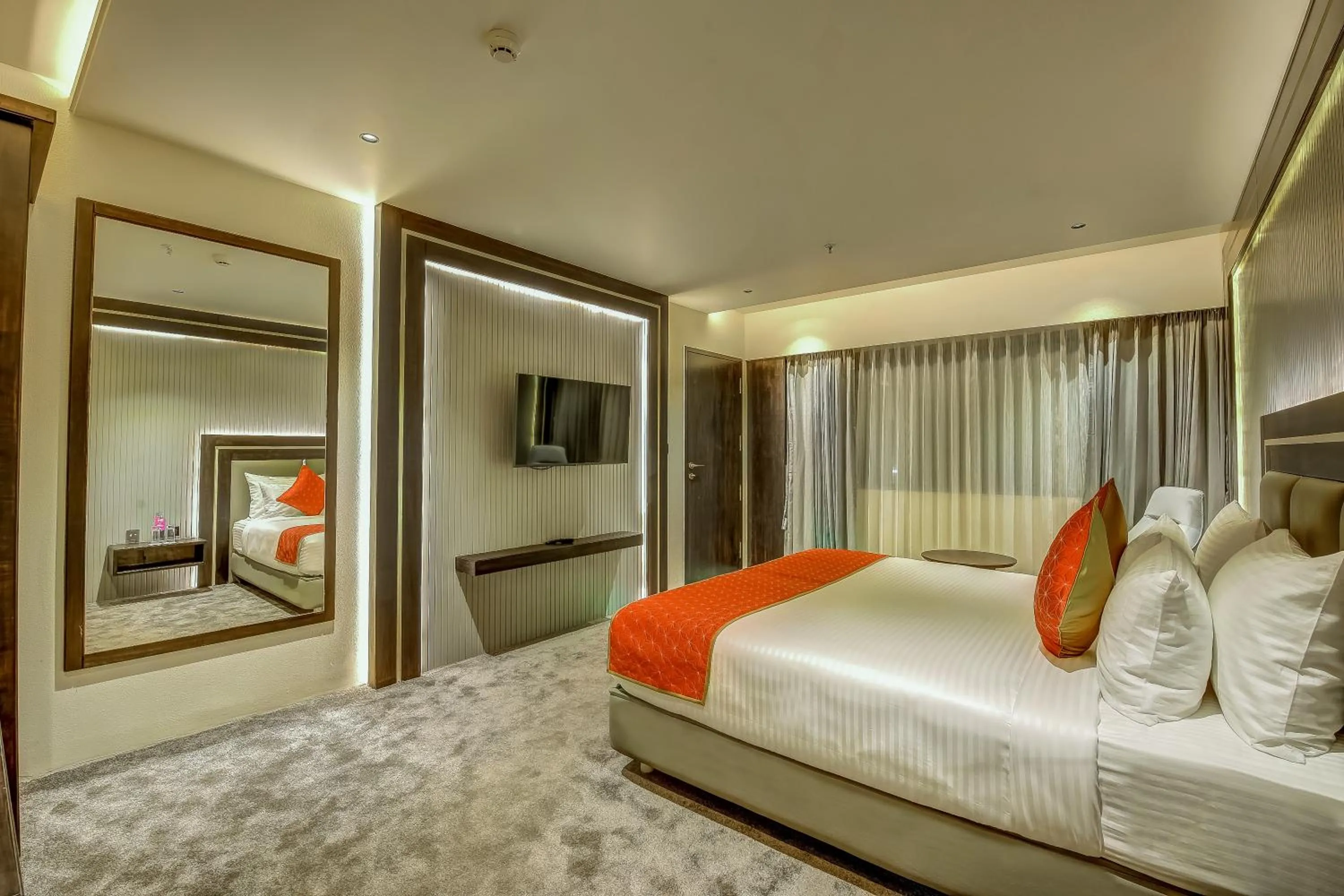 Living room, Bed in Regenta Central Javaji Mysore