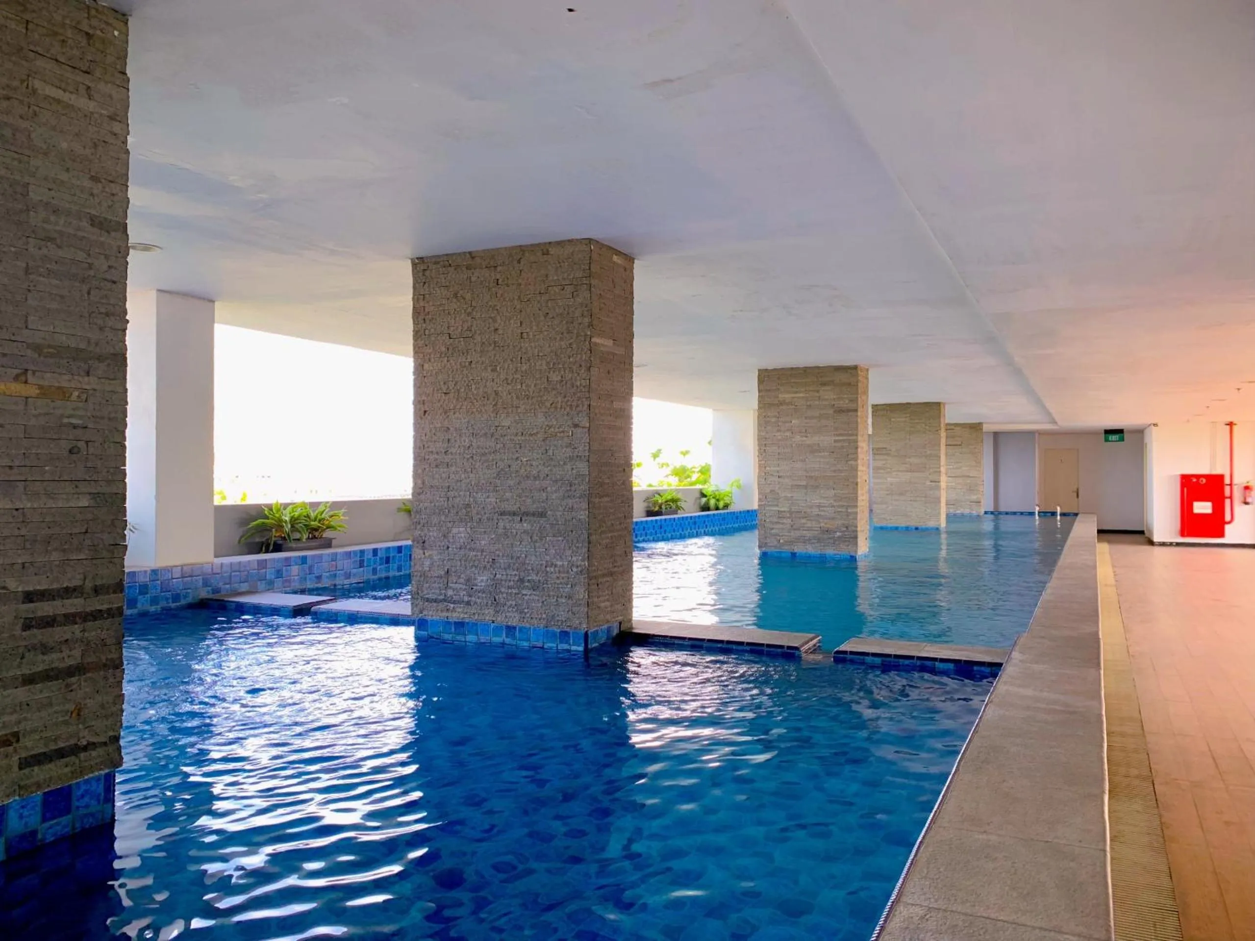 Swimming pool in Apartemen Poris 88 by Benchmark