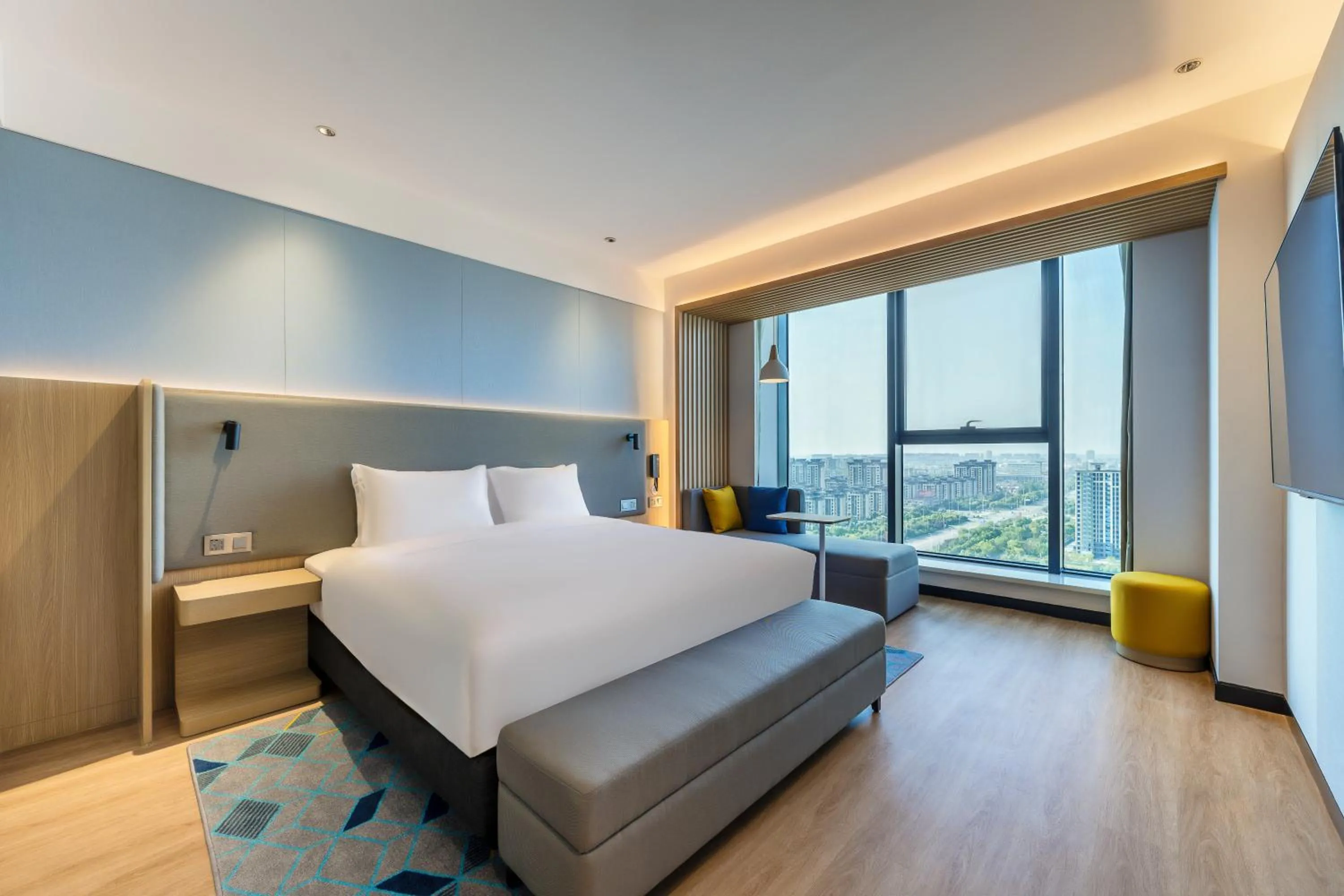 Bed in Holiday Inn Express Zhoukou Dancheng by IHG