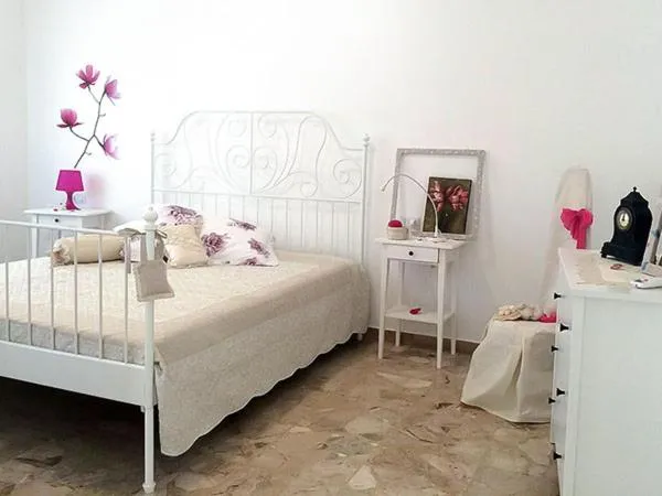 Bed in Azzurramare Bed & Breakfast