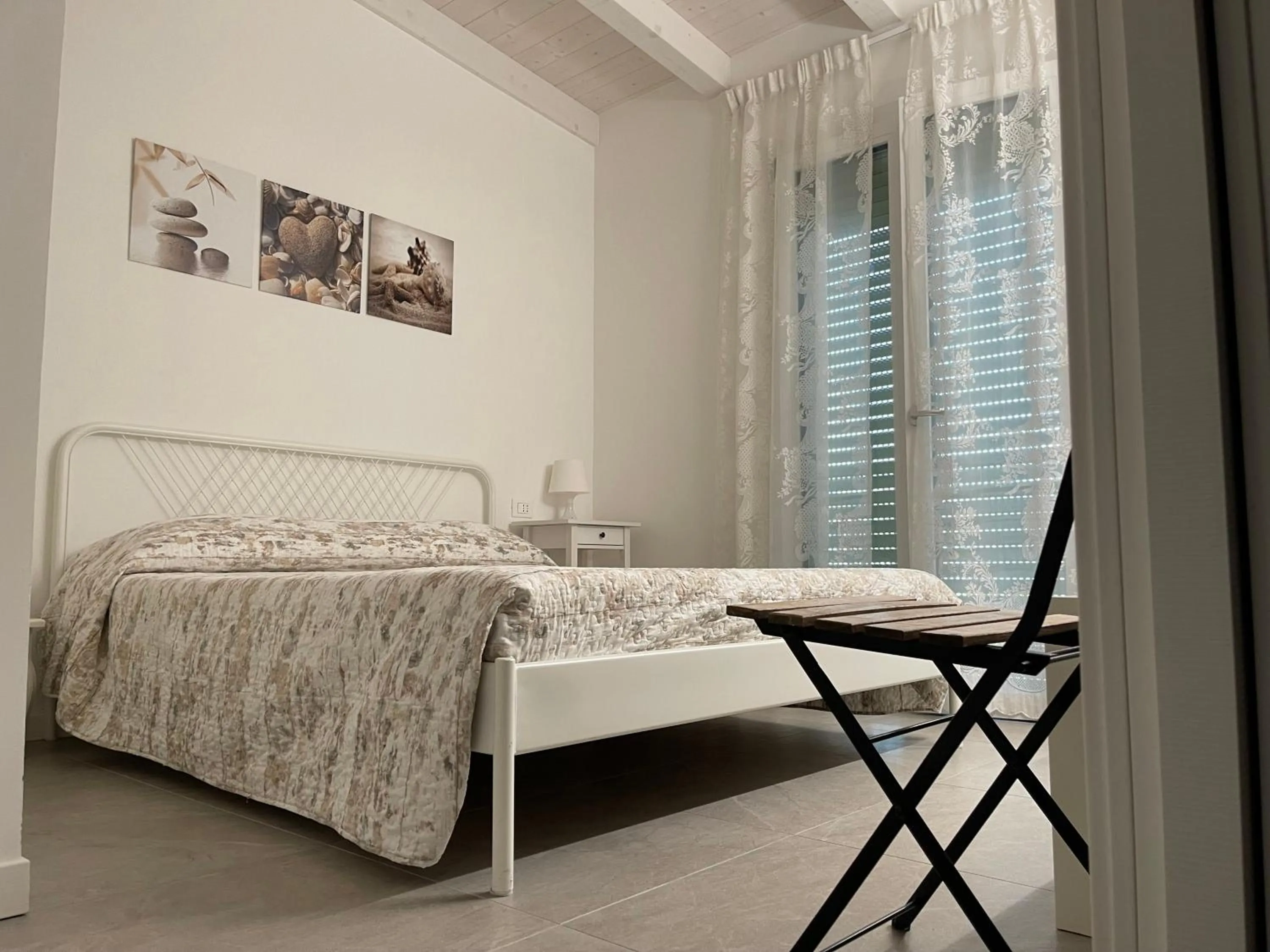 Bed in Azzurramare Bed & Breakfast