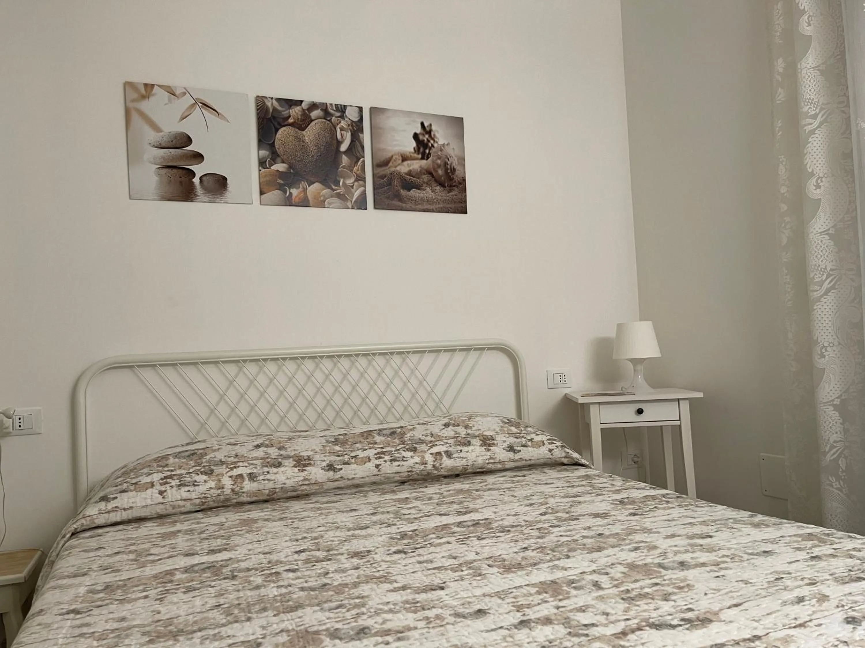 Bed in Azzurramare Bed & Breakfast