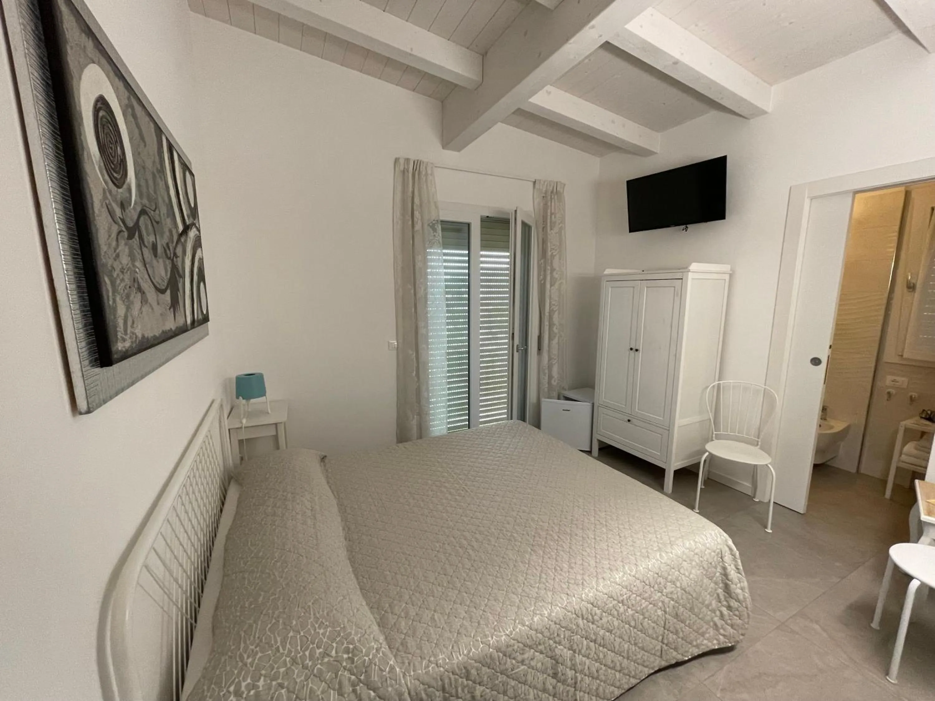 Bed in Azzurramare Bed & Breakfast