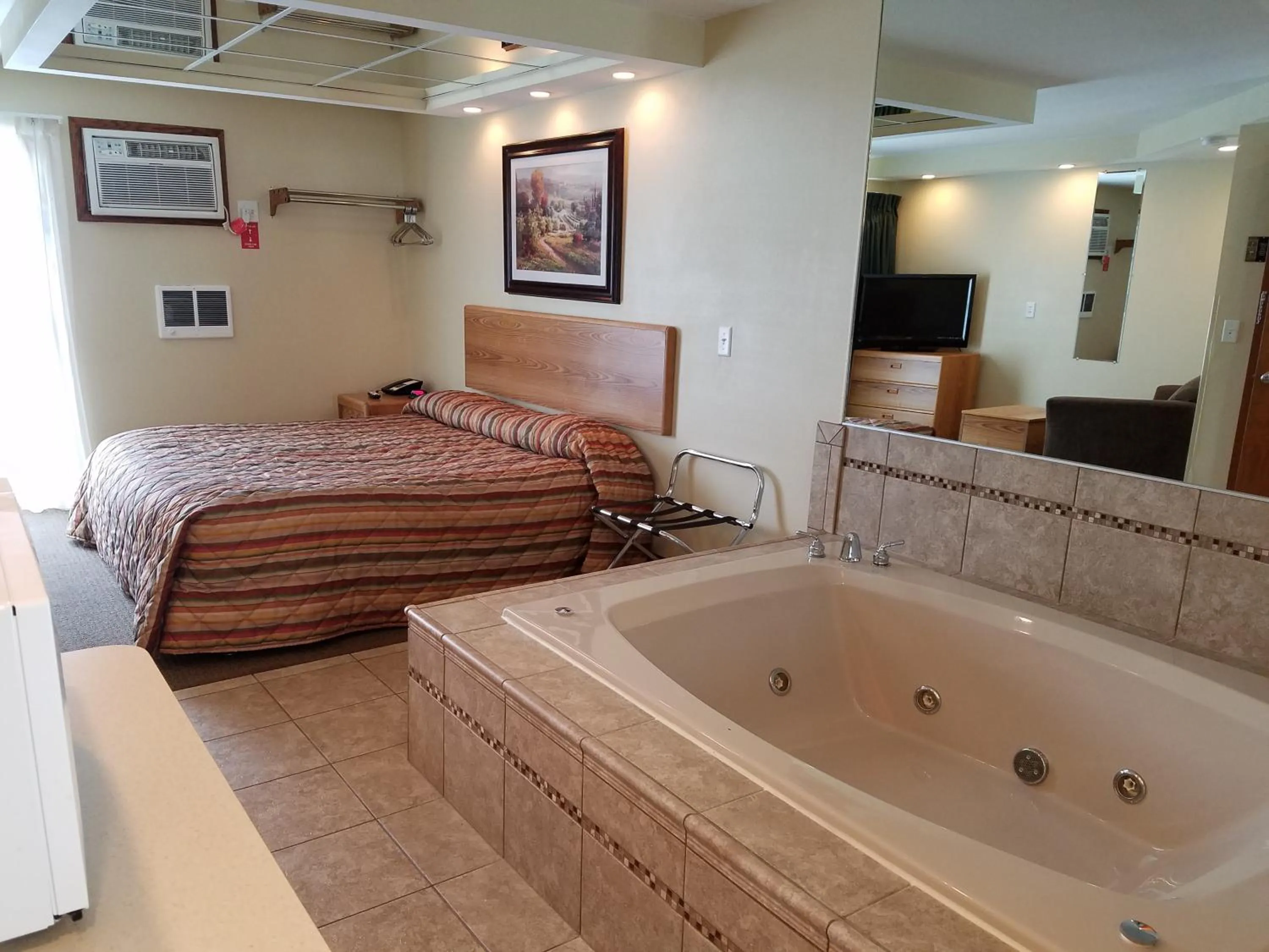 Bed in Black Hawk Motel & Suites